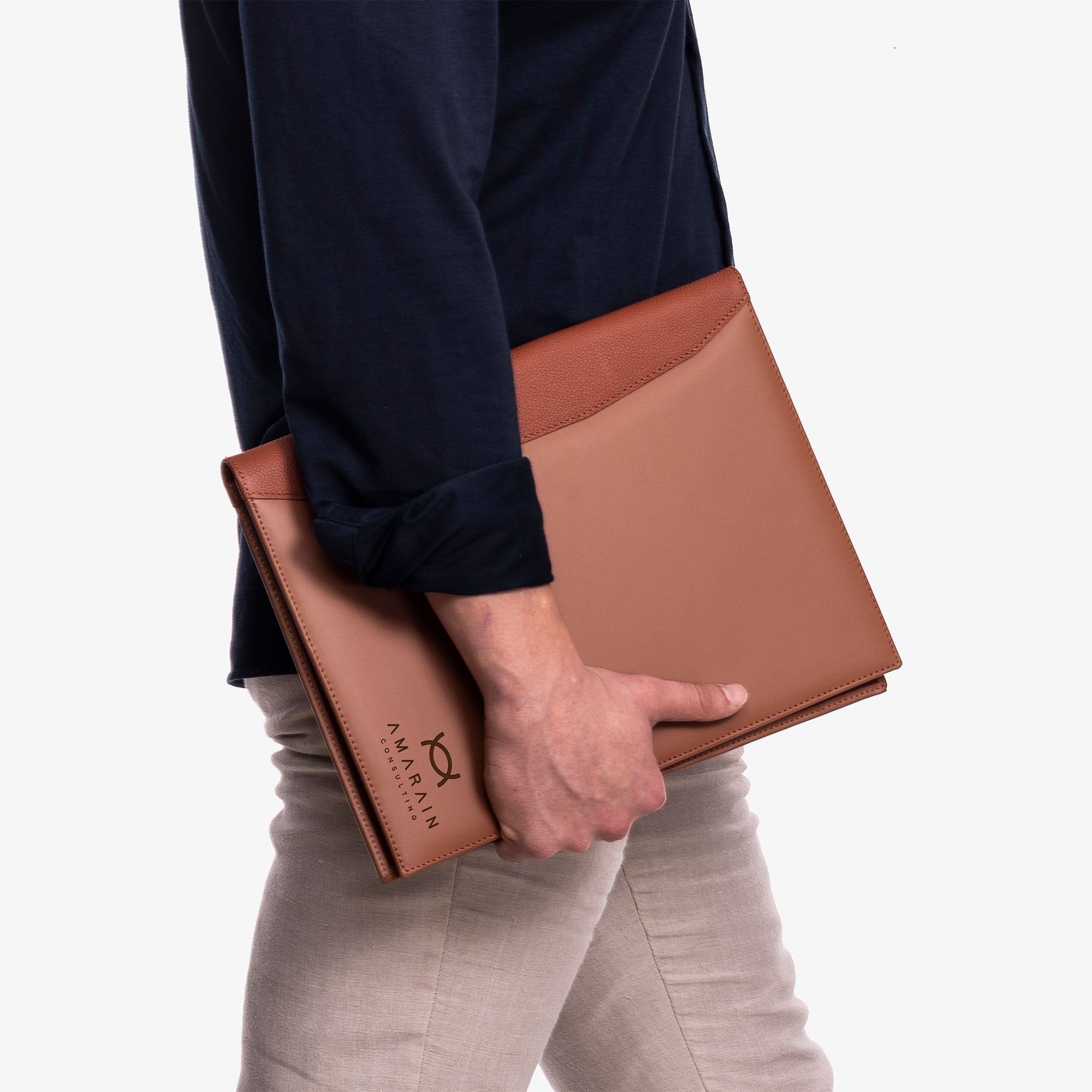 Model holding personalized Brown Leather A4 padfolio in hand
