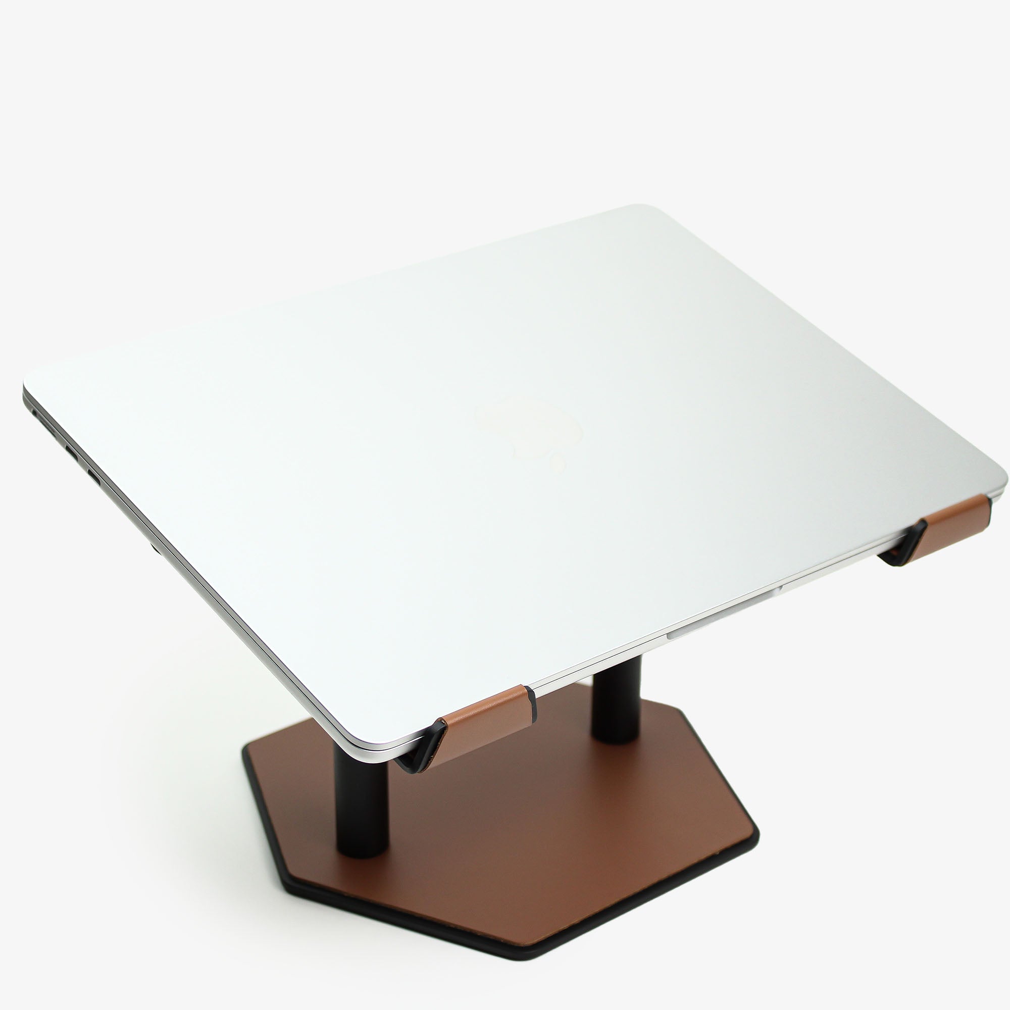 Side angle showing the ergonomic tilt of the chestnut laptop stand #color_chestnut