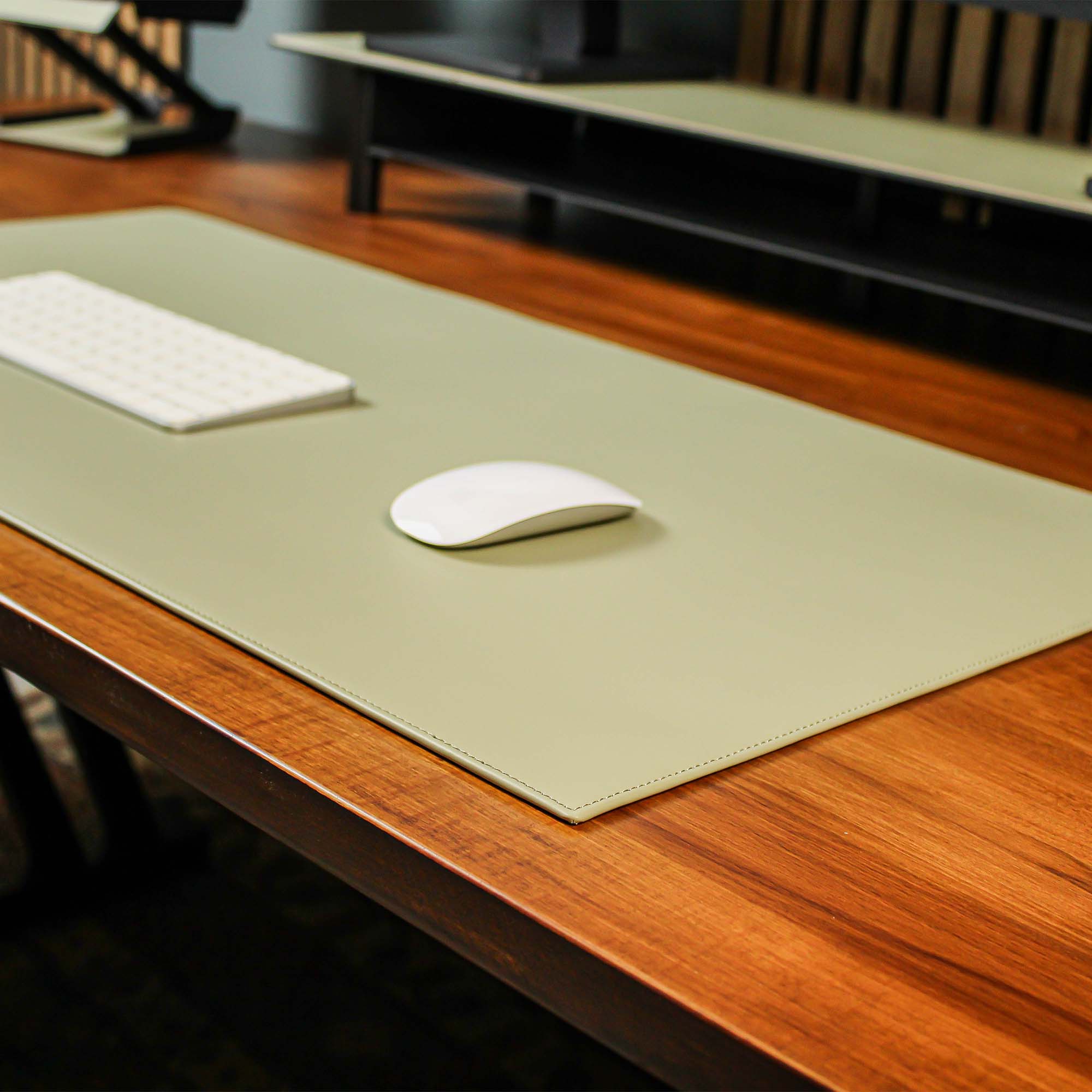 Green Leather desk mat on the desk