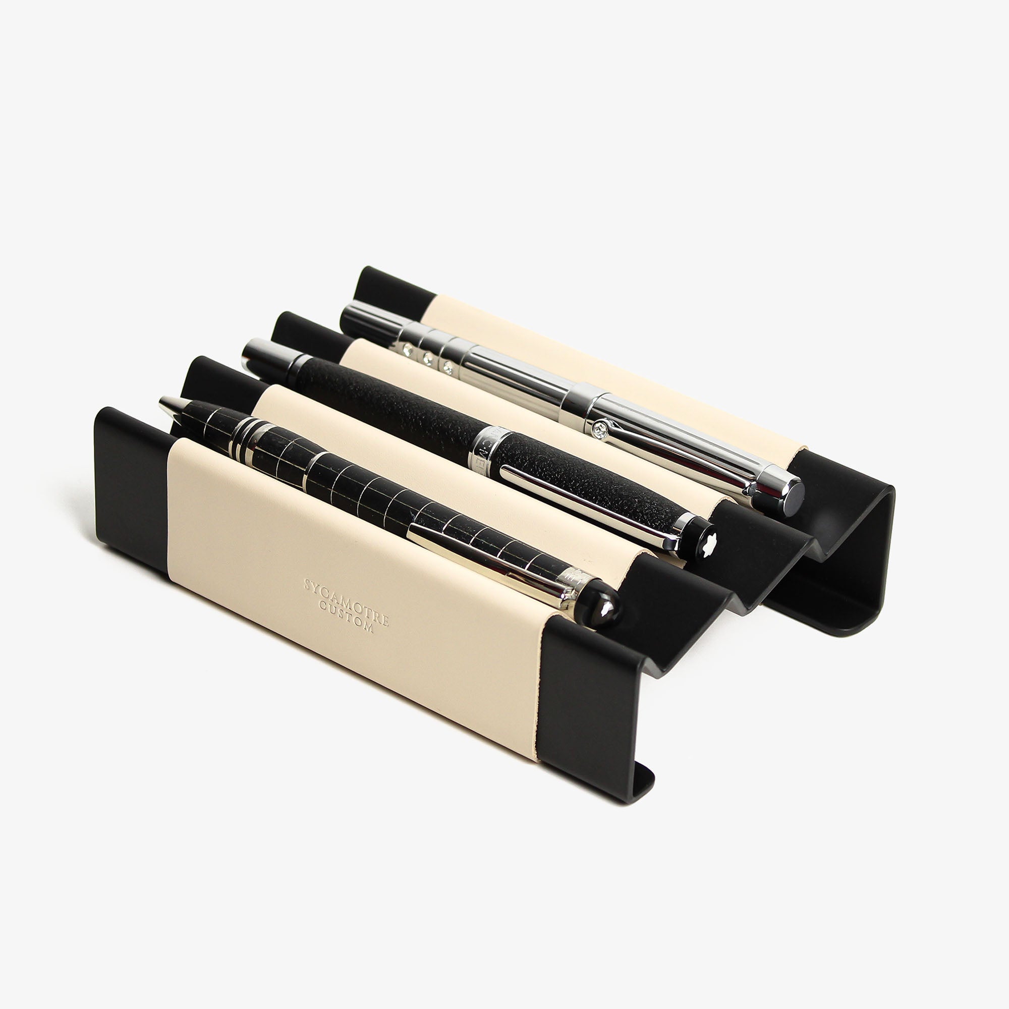 Side angle showing the depth and detail of the beige pen tray #color_beige
