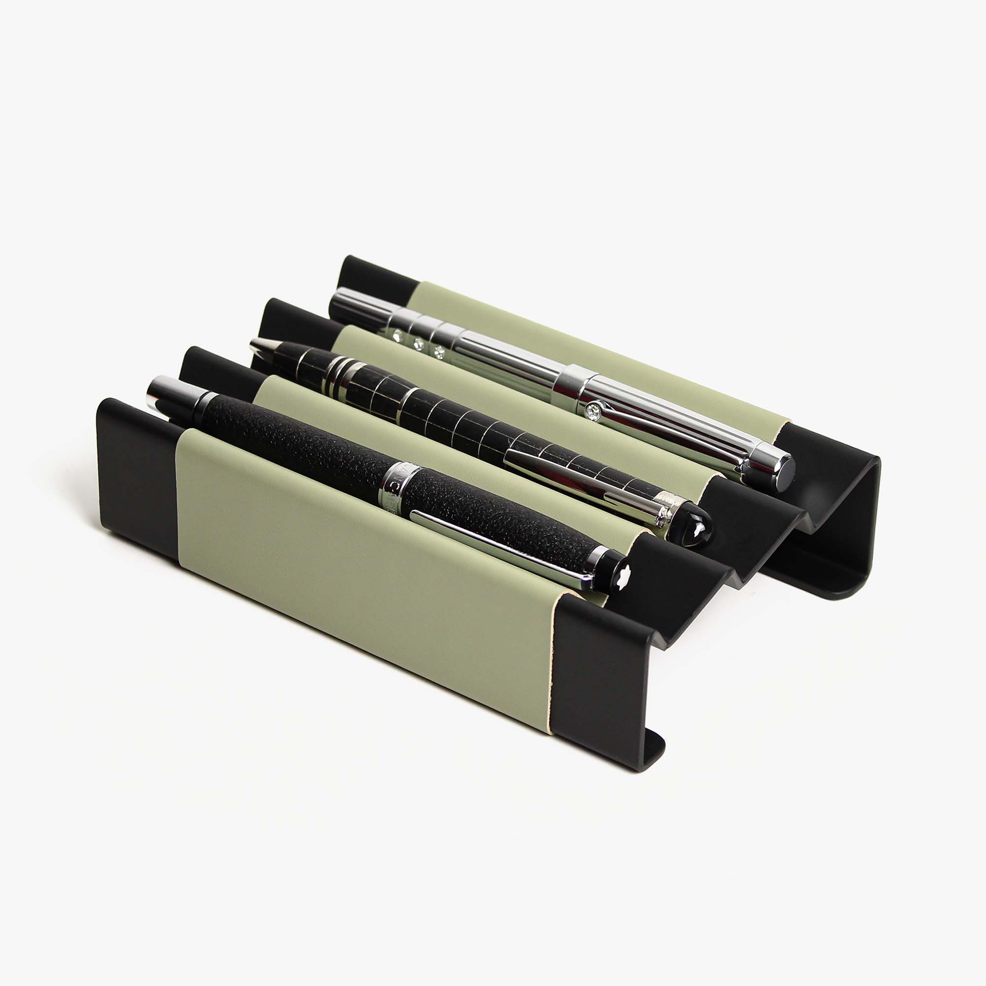 Side angle showing the depth and detail of the sage-green pen tray