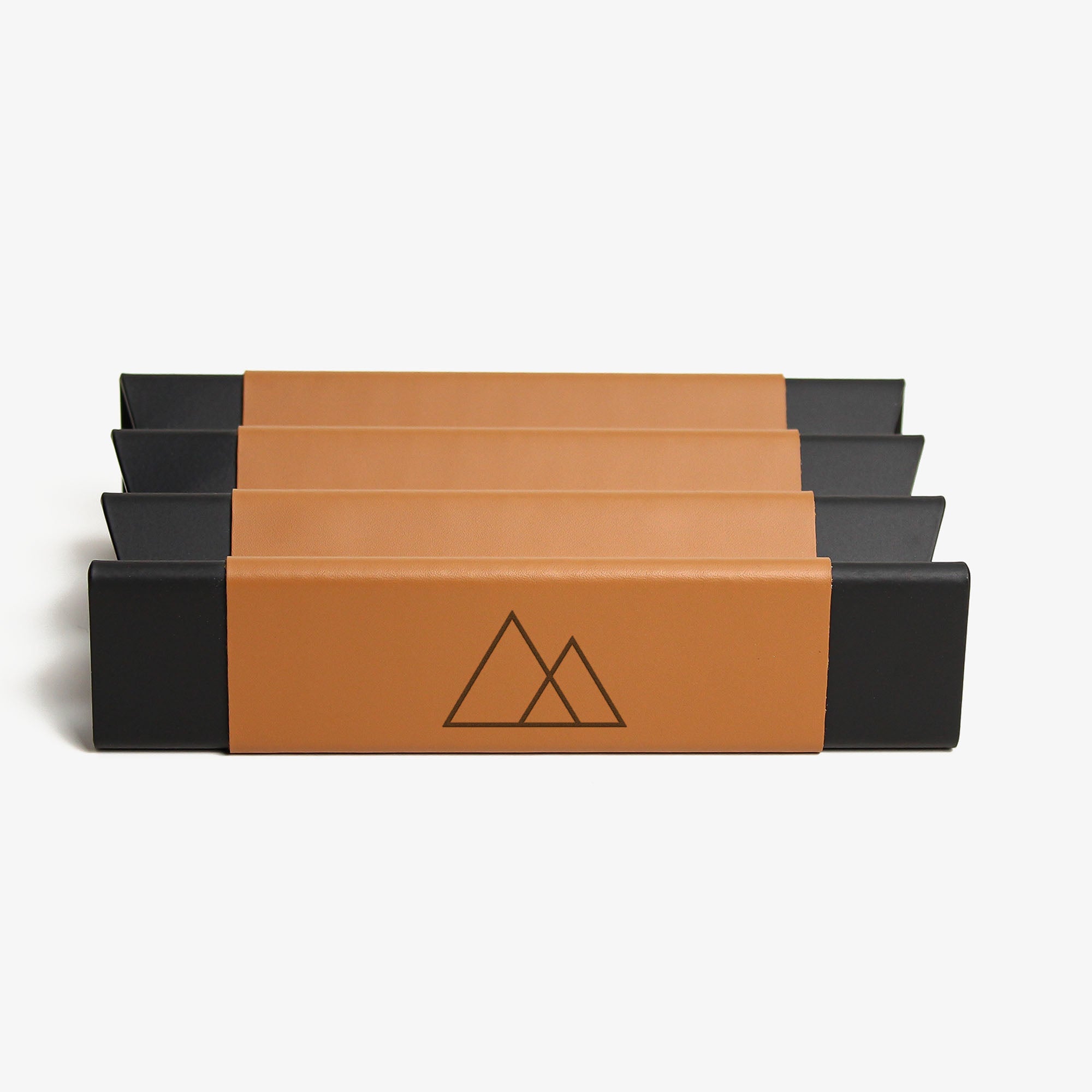 Front view showing the shape and finish of the cognac pen tray