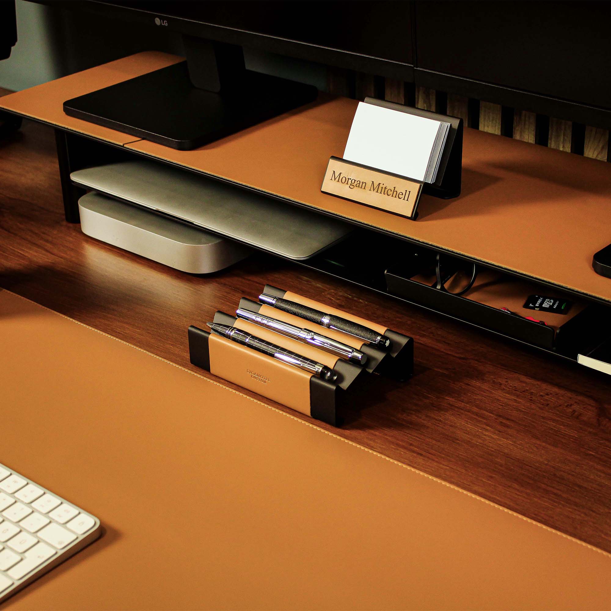 Minimalist workspace setup featuring the cognac pen tray