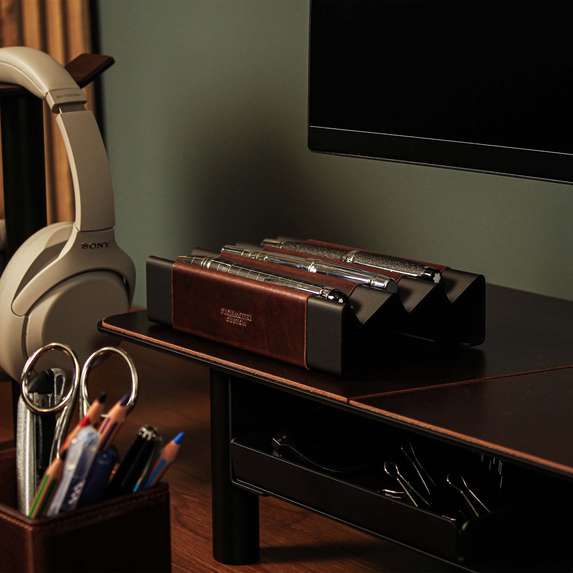 Minimalist workspace setup featuring the crazy-chestnut pen tray