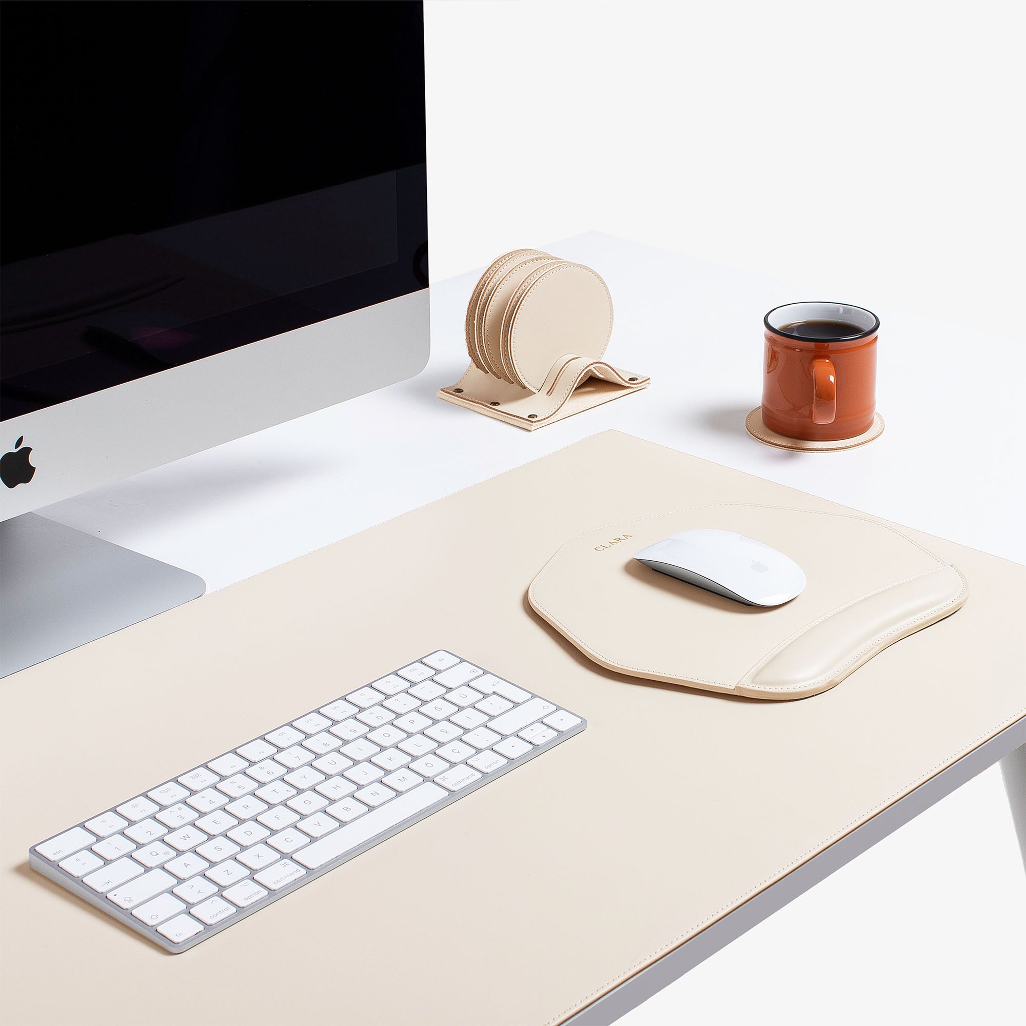 Beige Leather desk mat on the desk