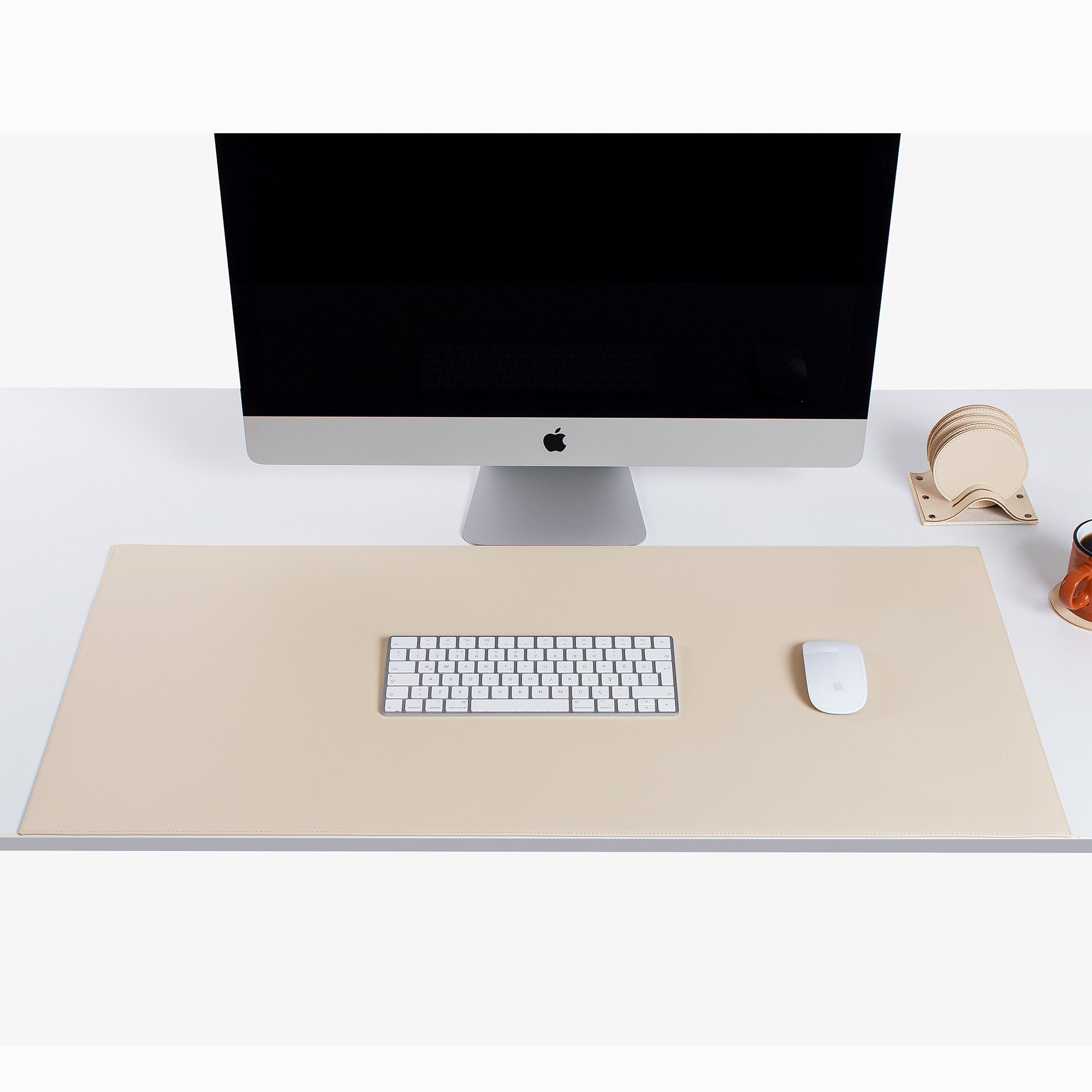 Beige Leather desk mat on the desk