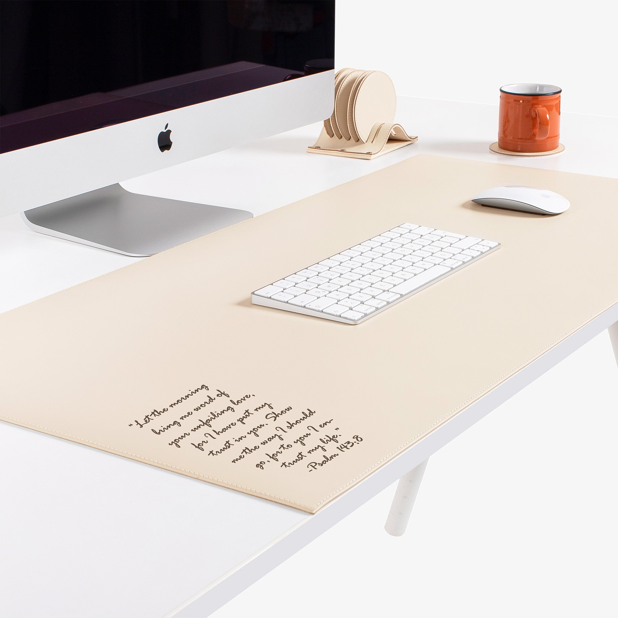 Beige Leather desk mat on the desk