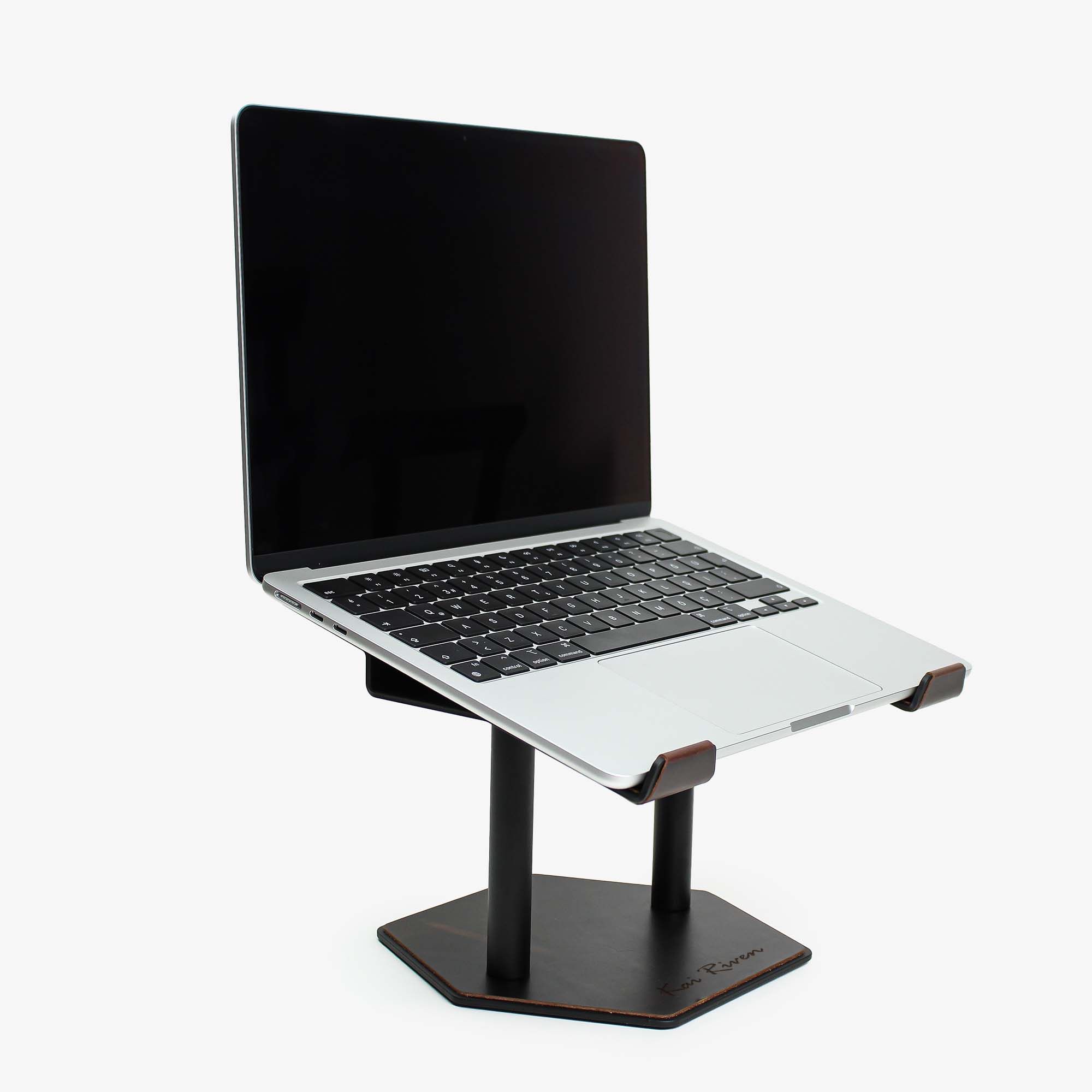 Front view of the crazy-chestnut leather and aluminum laptop riser on a desk