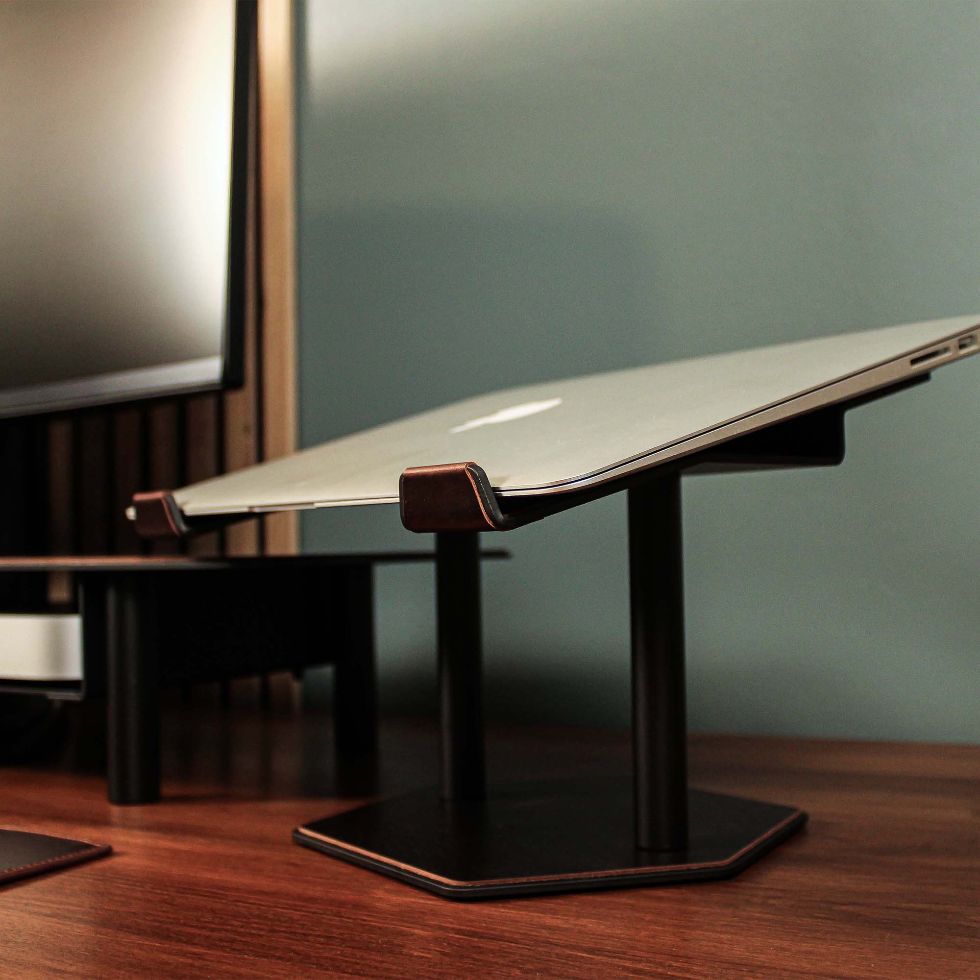 Close-up of the padded base of the crazy-chestnut laptop riser for desk protection