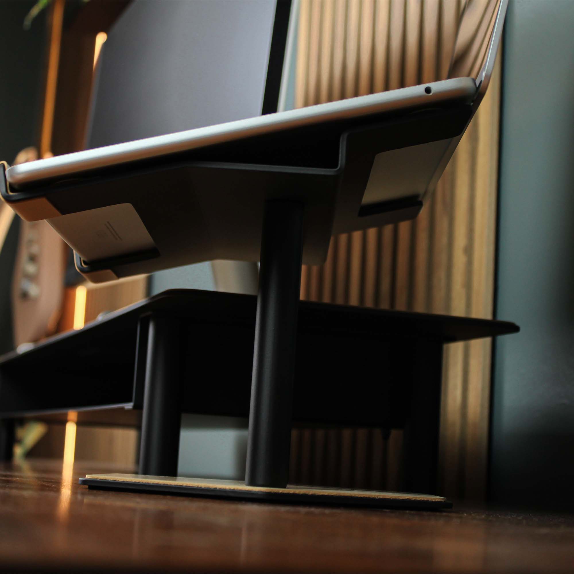 Lifestyle setup featuring the latte laptop riser with matching accessories