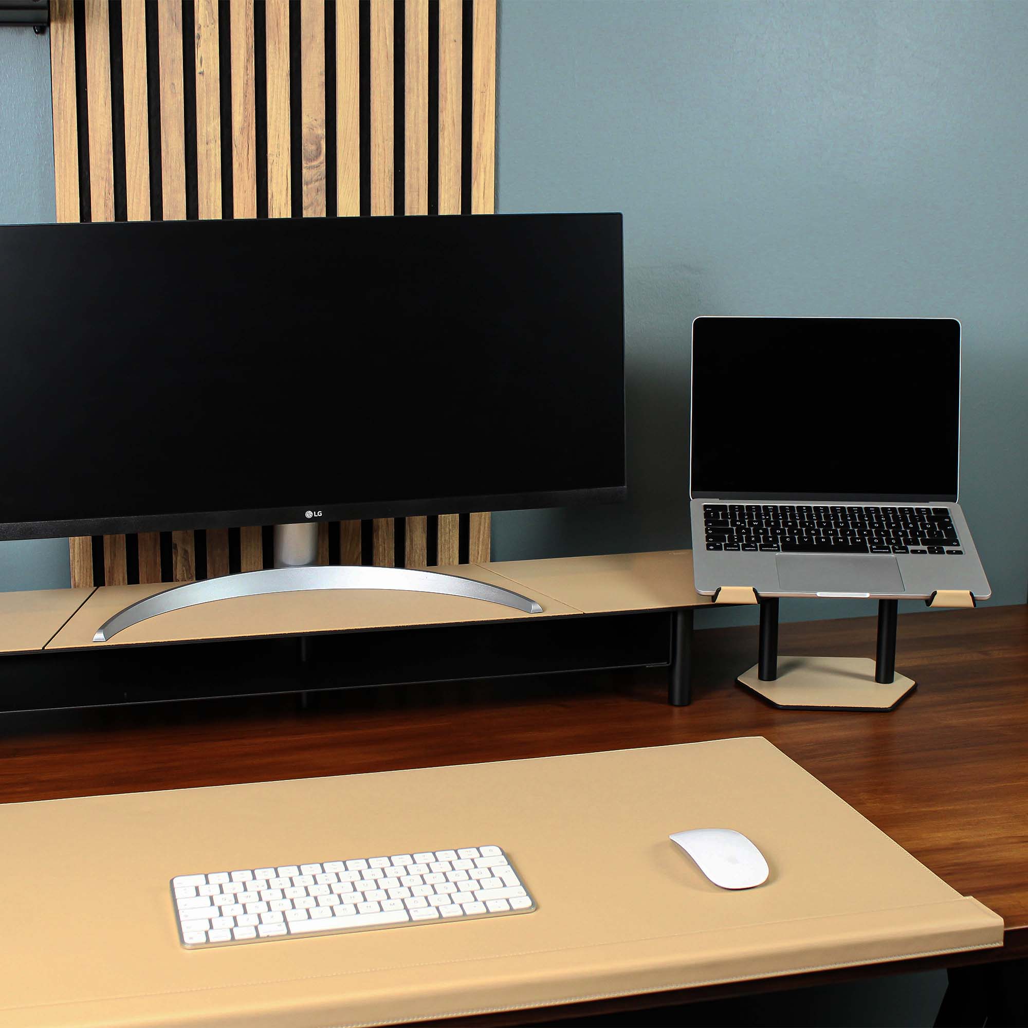 Lifestyle setup featuring the latte laptop riser with matching accessories