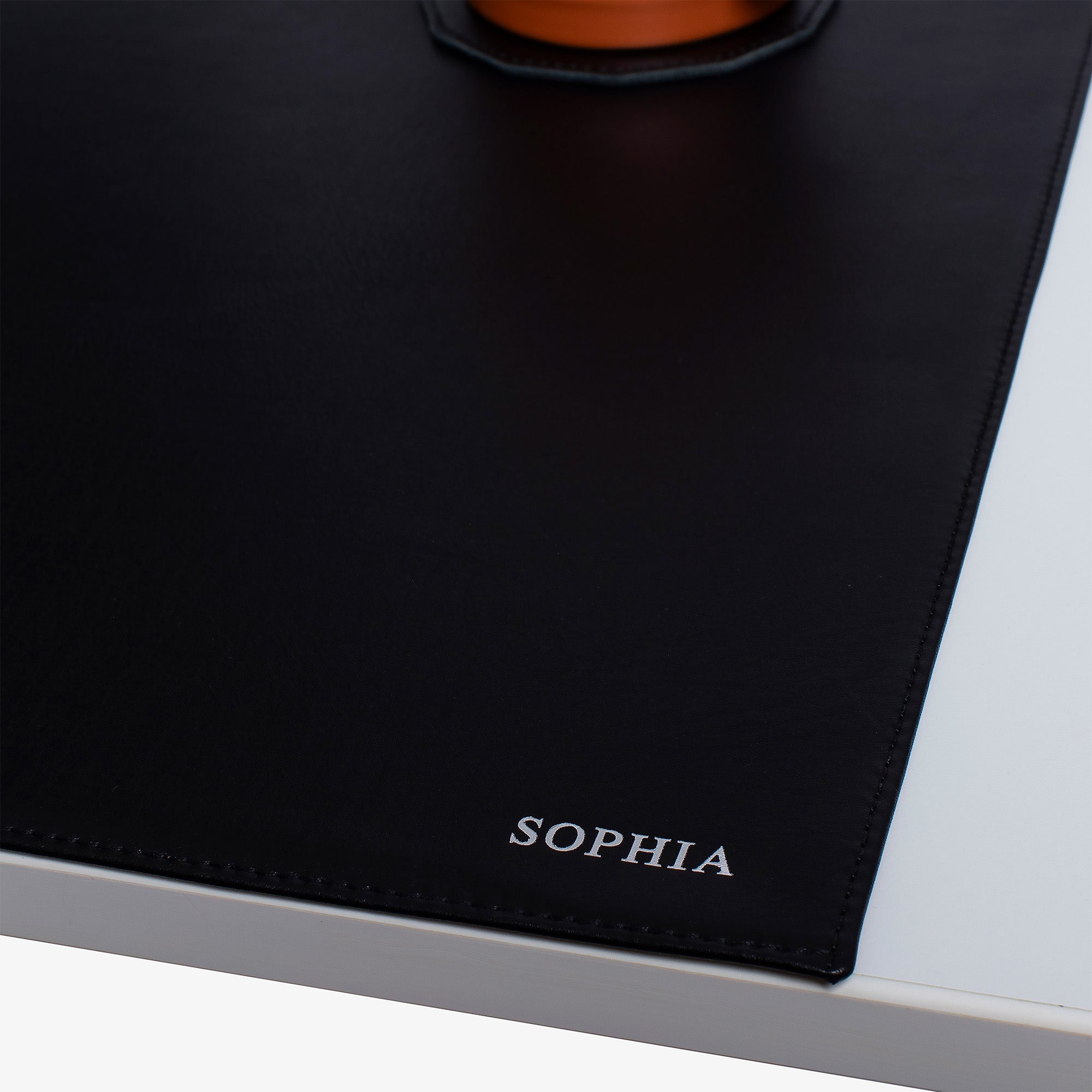 Black Leather desk mat on the desk