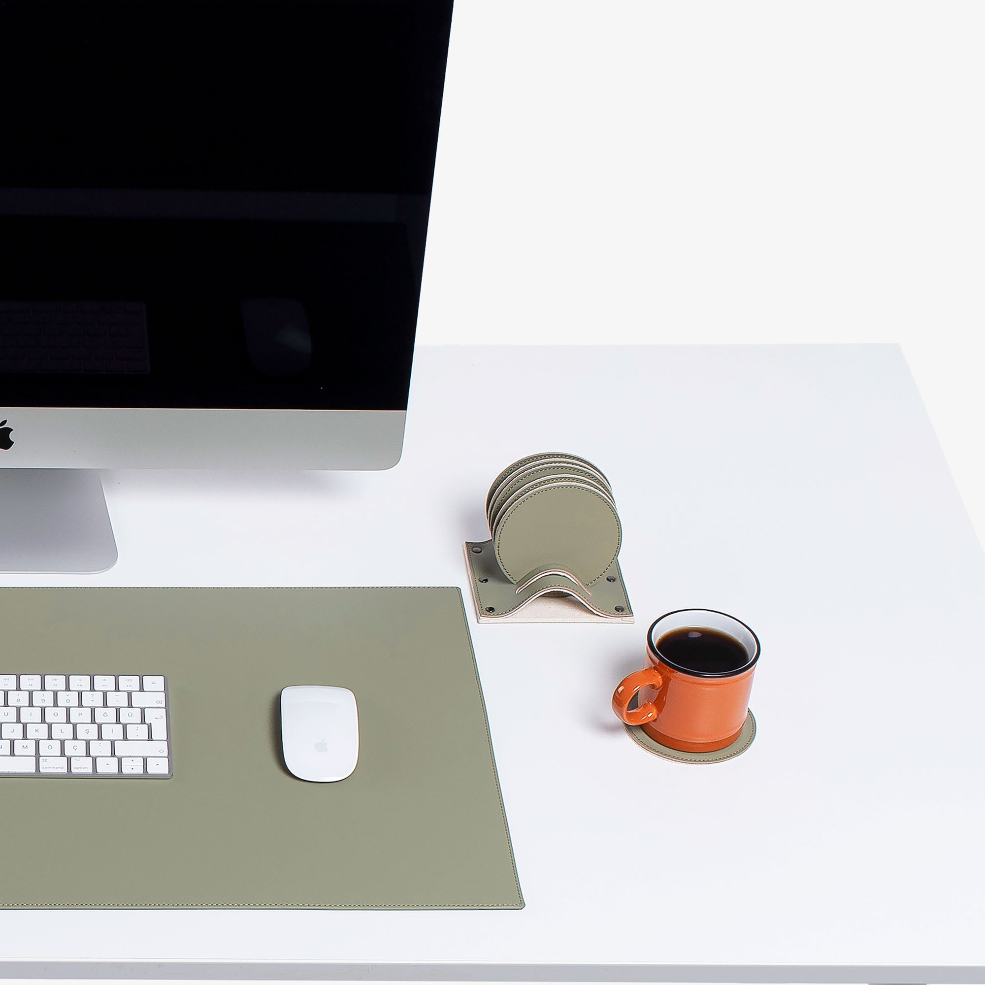 Green Leather desk mat on the desk