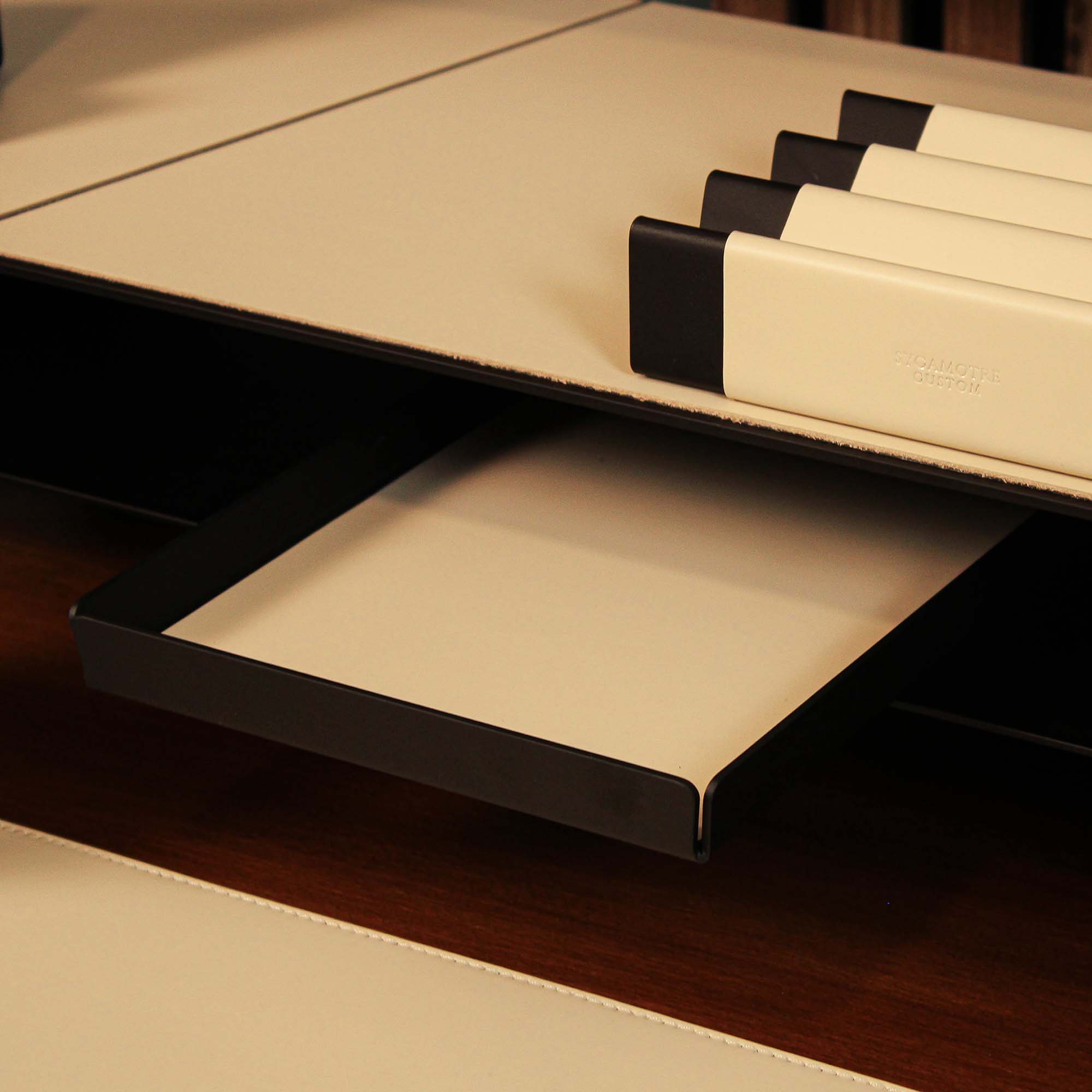 Group photo showing the full metal and leather collection with the beige valet tray