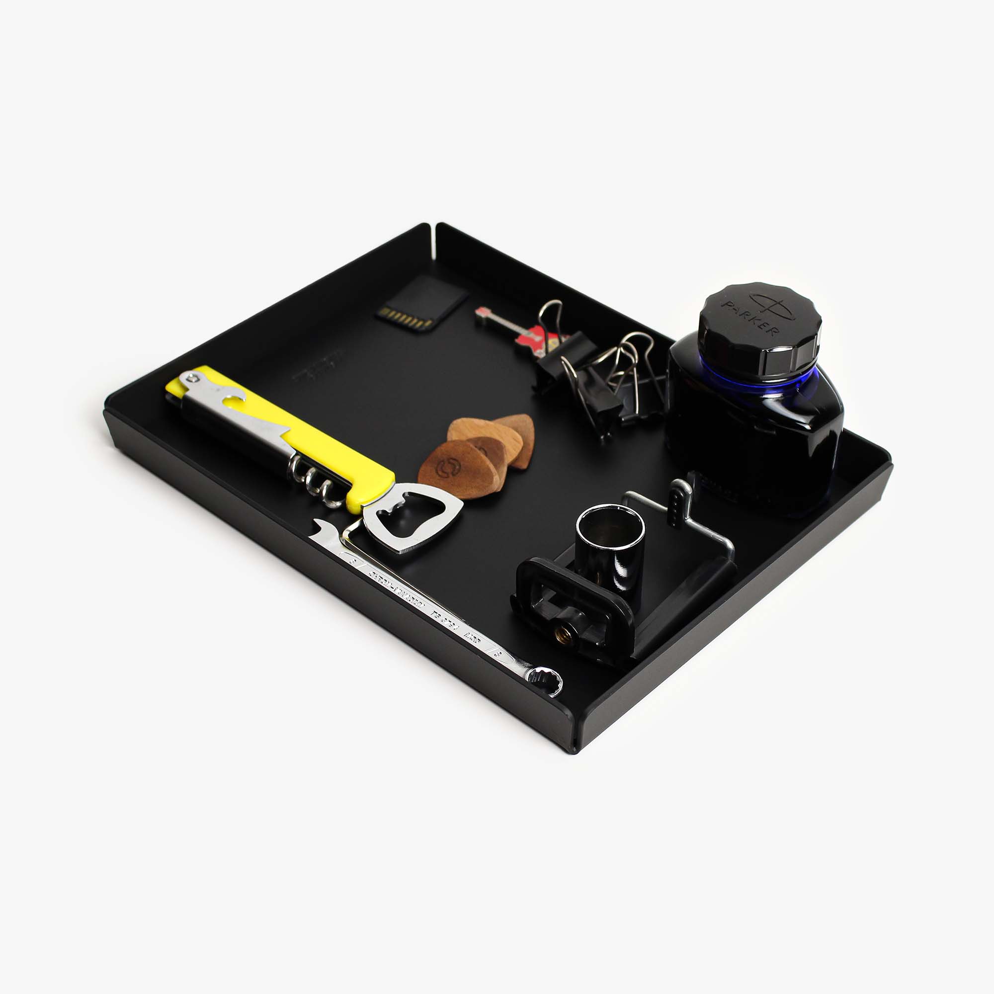 Side angle showing the sleek edges of the black valet tray