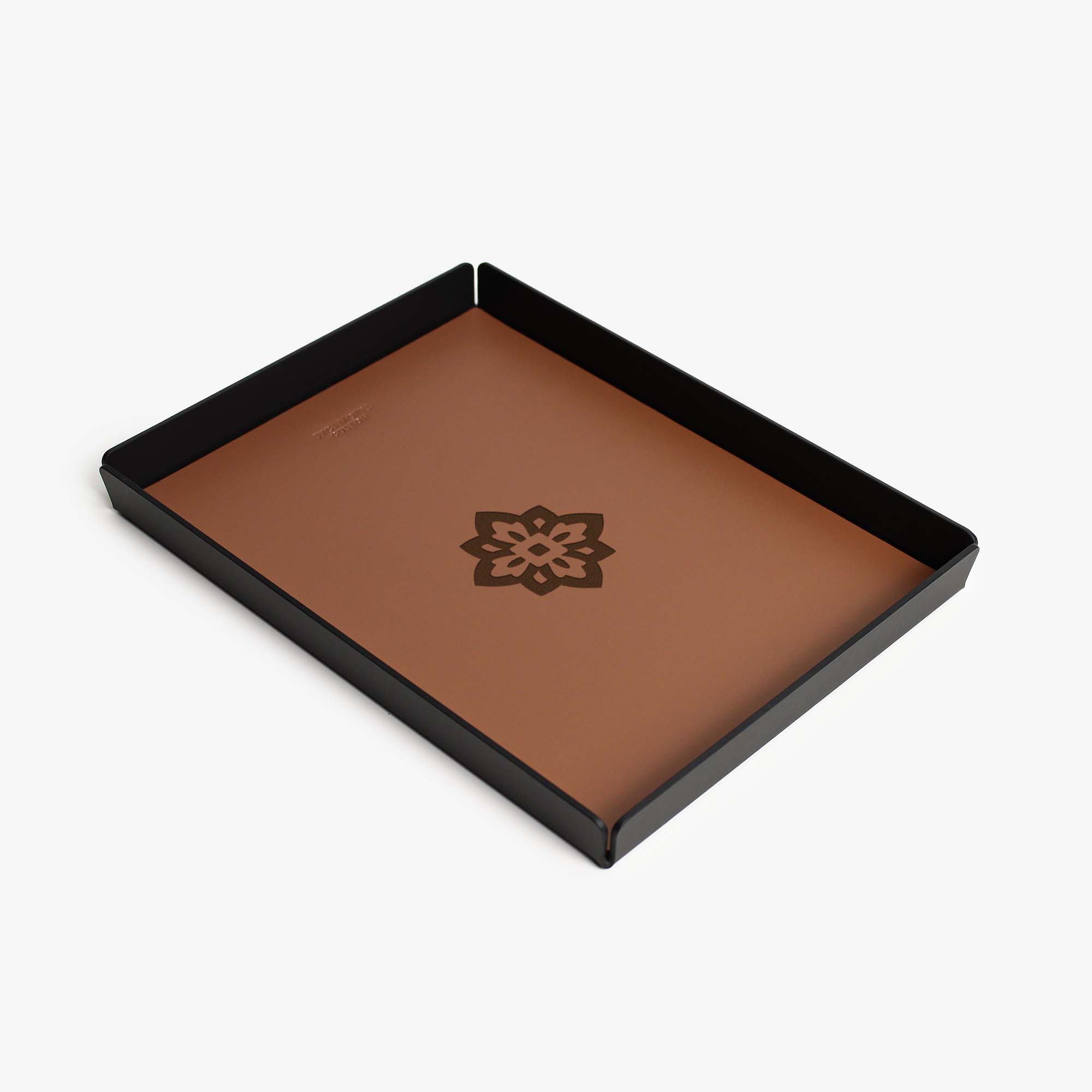 Side angle showing the sleek edges of the chestnut valet tray #color_chestnut