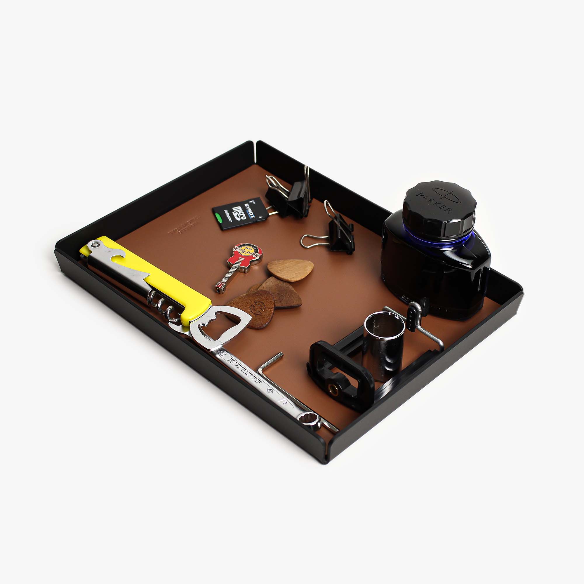 Side angle showing the sleek edges of the chestnut valet tray #color_chestnut