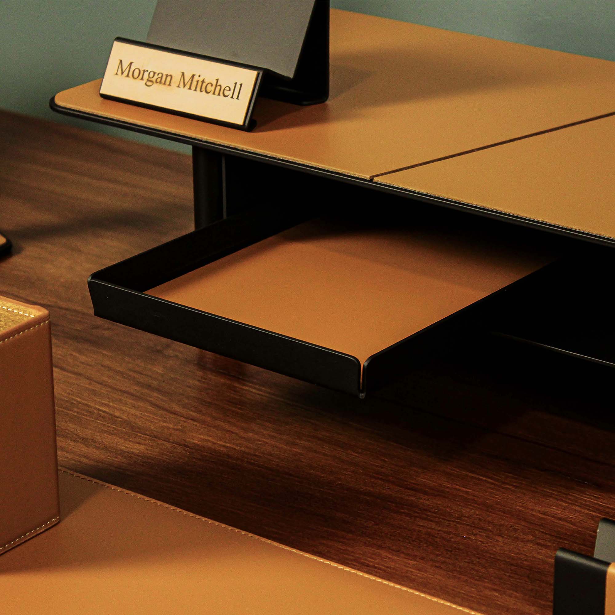 Minimalist desk setup featuring the cognac valet tray with accessories