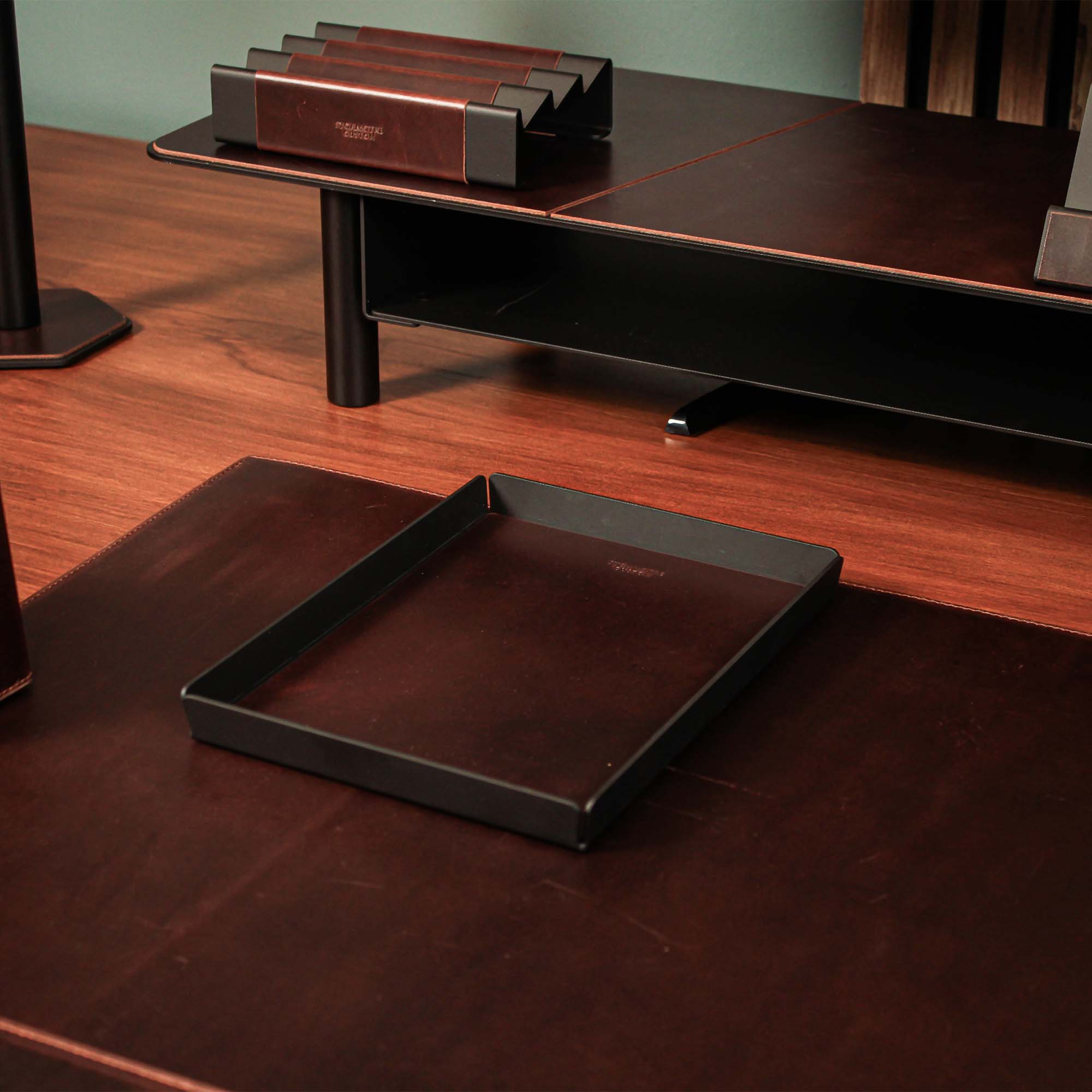 Minimalist desk setup featuring the crazy-chestnut valet tray with accessories