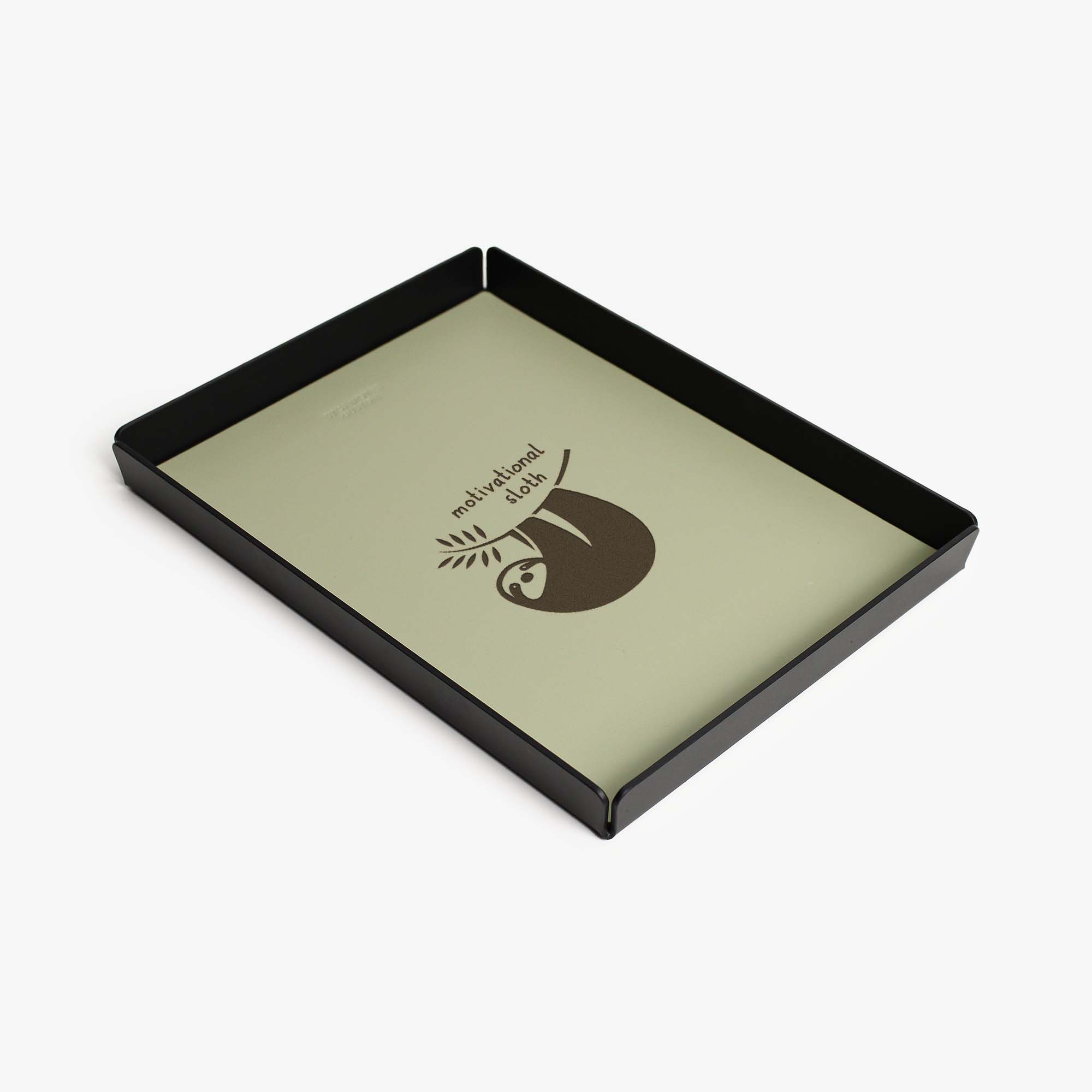 Side angle showing the sleek edges of the sage-green valet tray #color_sage-green
