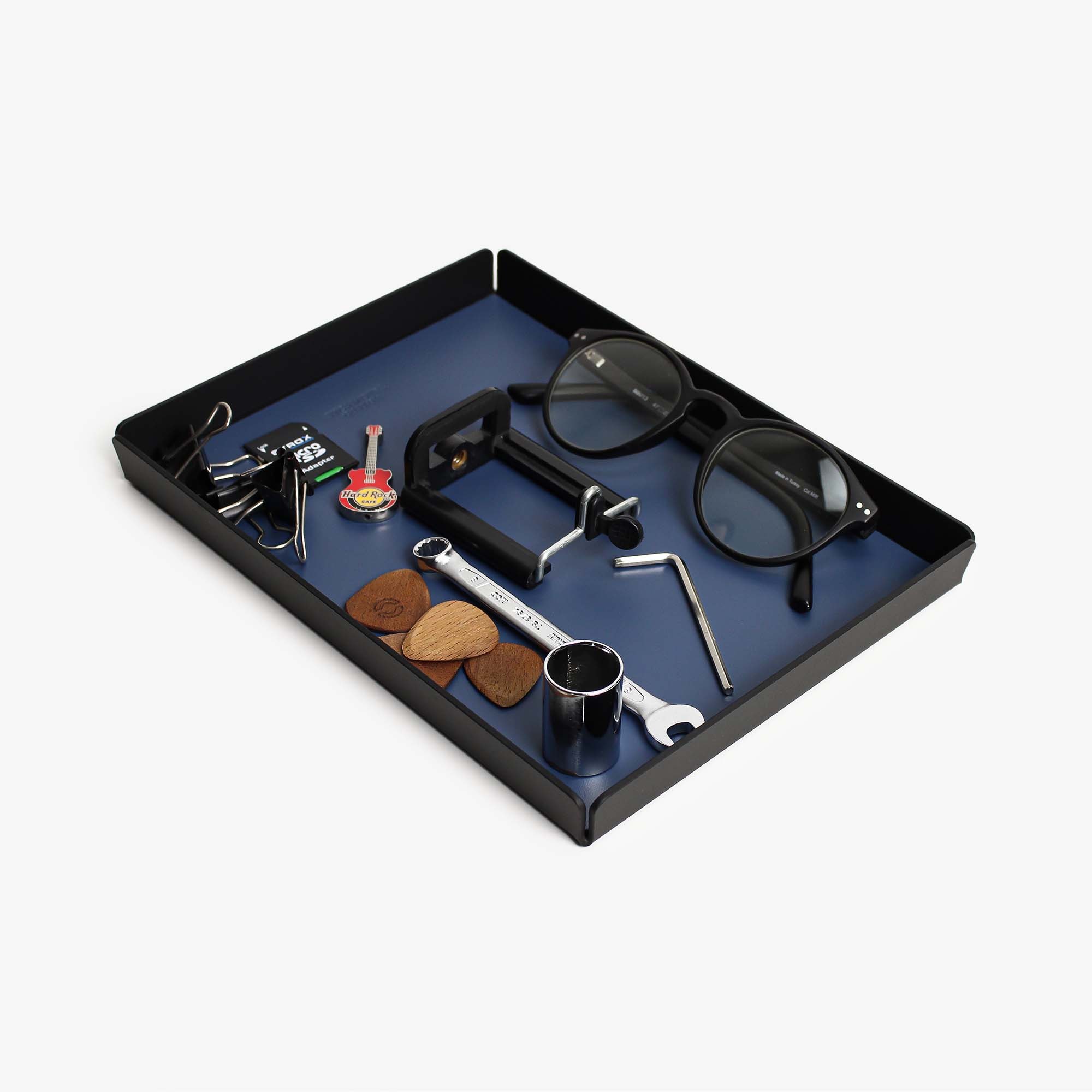 Close-up of the padded base of the ocean-blue valet tray for surface protection