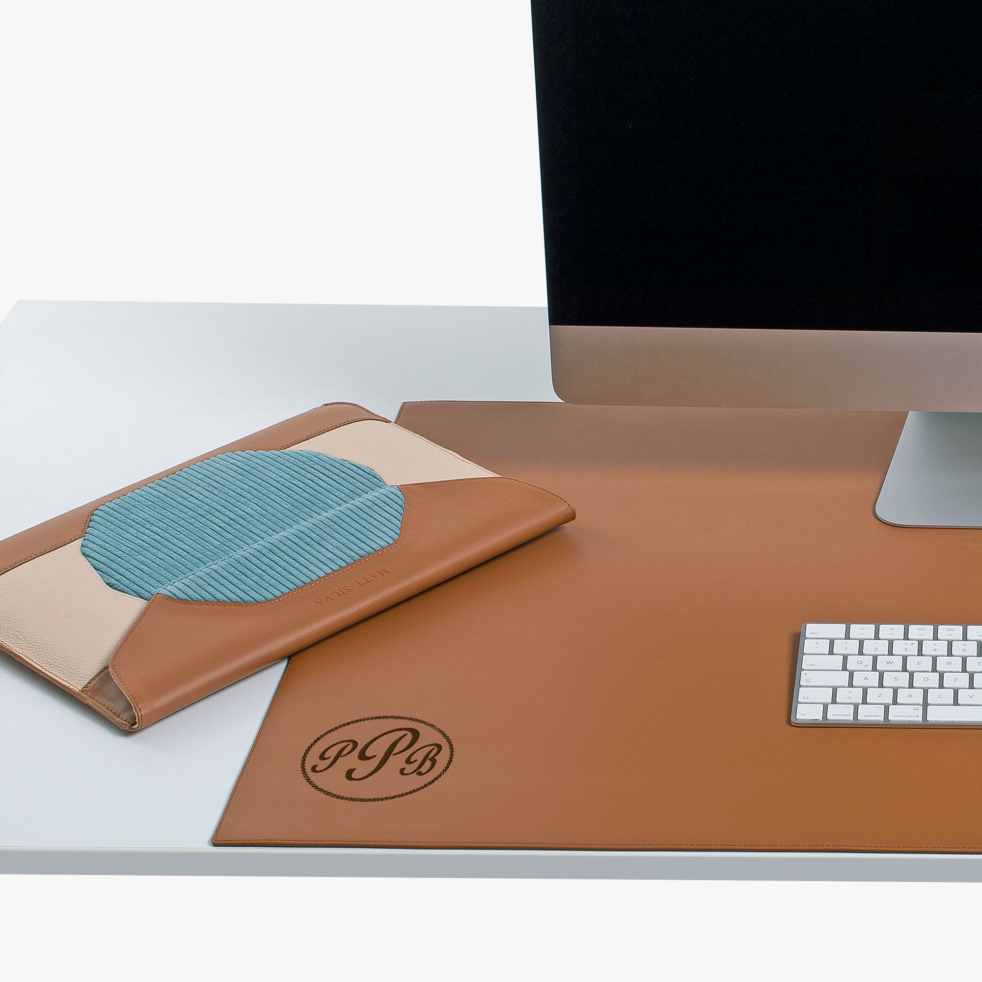 Brown Leather desk mat on the desk
