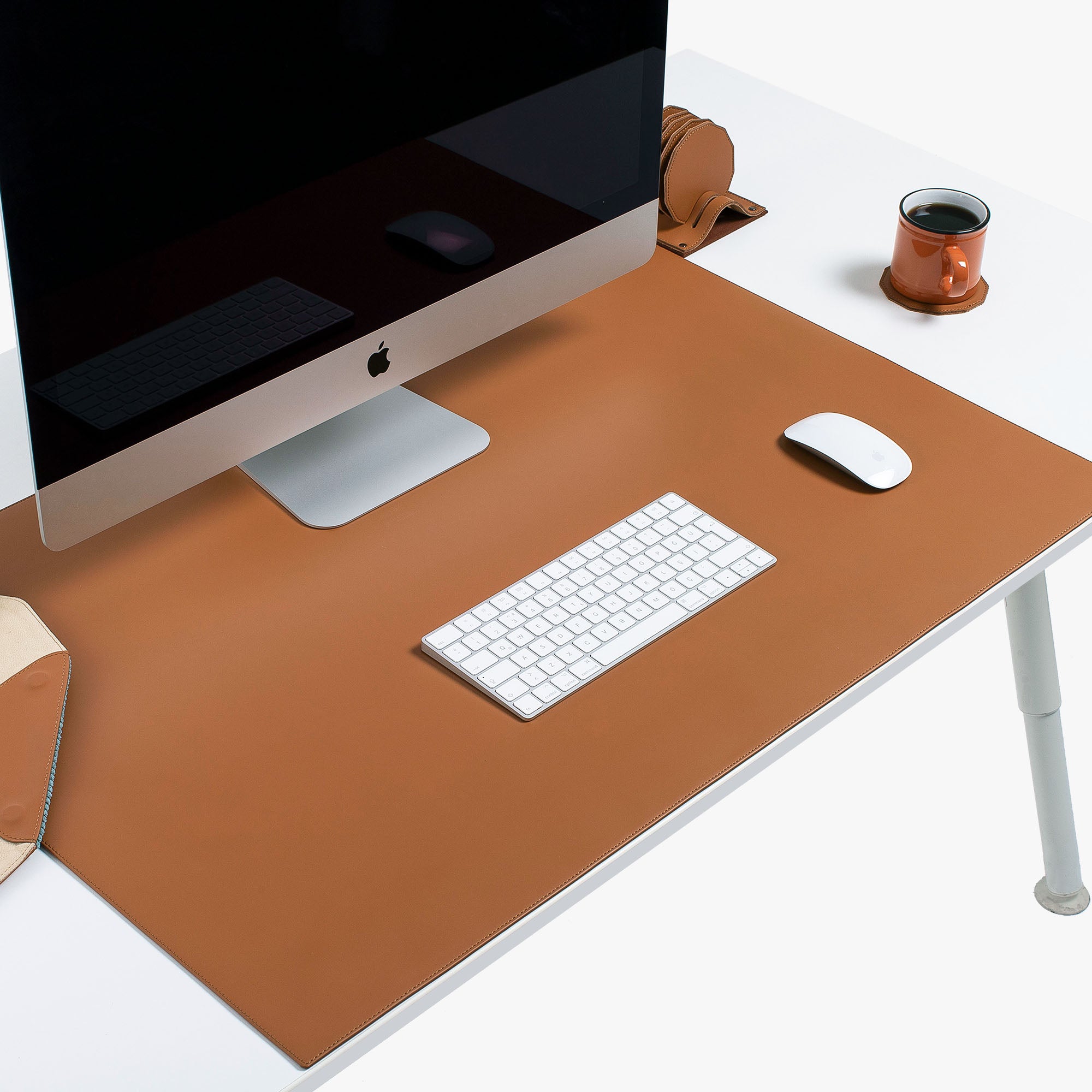 Brown Leather desk mat on the desk