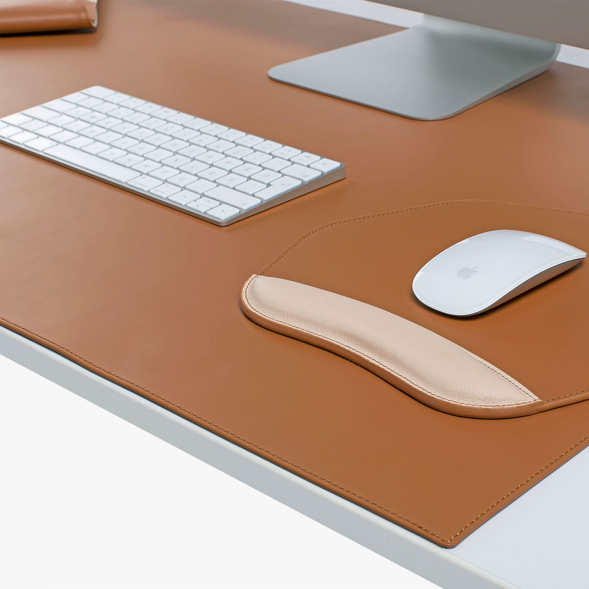 Brown Leather desk mat on the desk