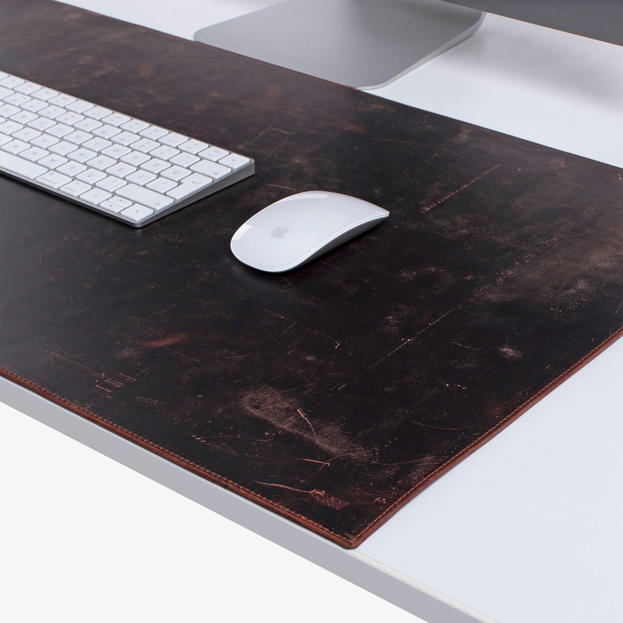 Brown Leather desk mat on the desk