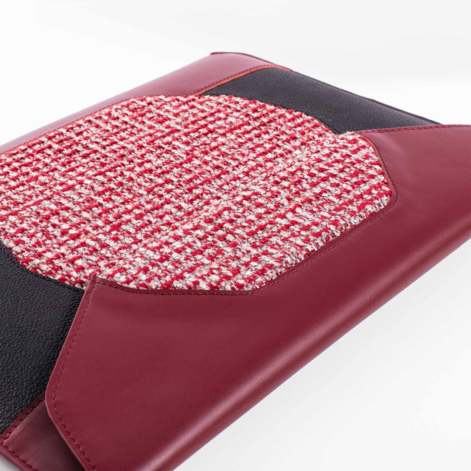 Personalized red leather MacBook sleeve on the desk