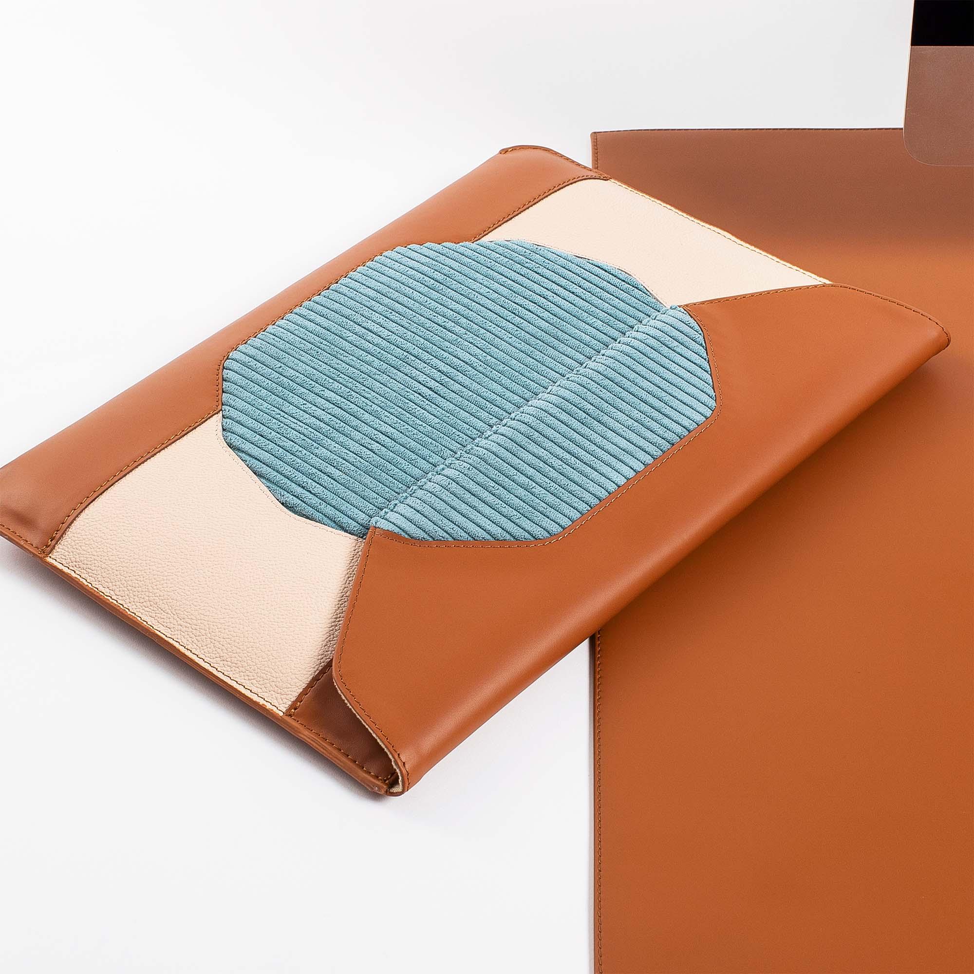Custom tan leather MacBook sleeve with personalization options