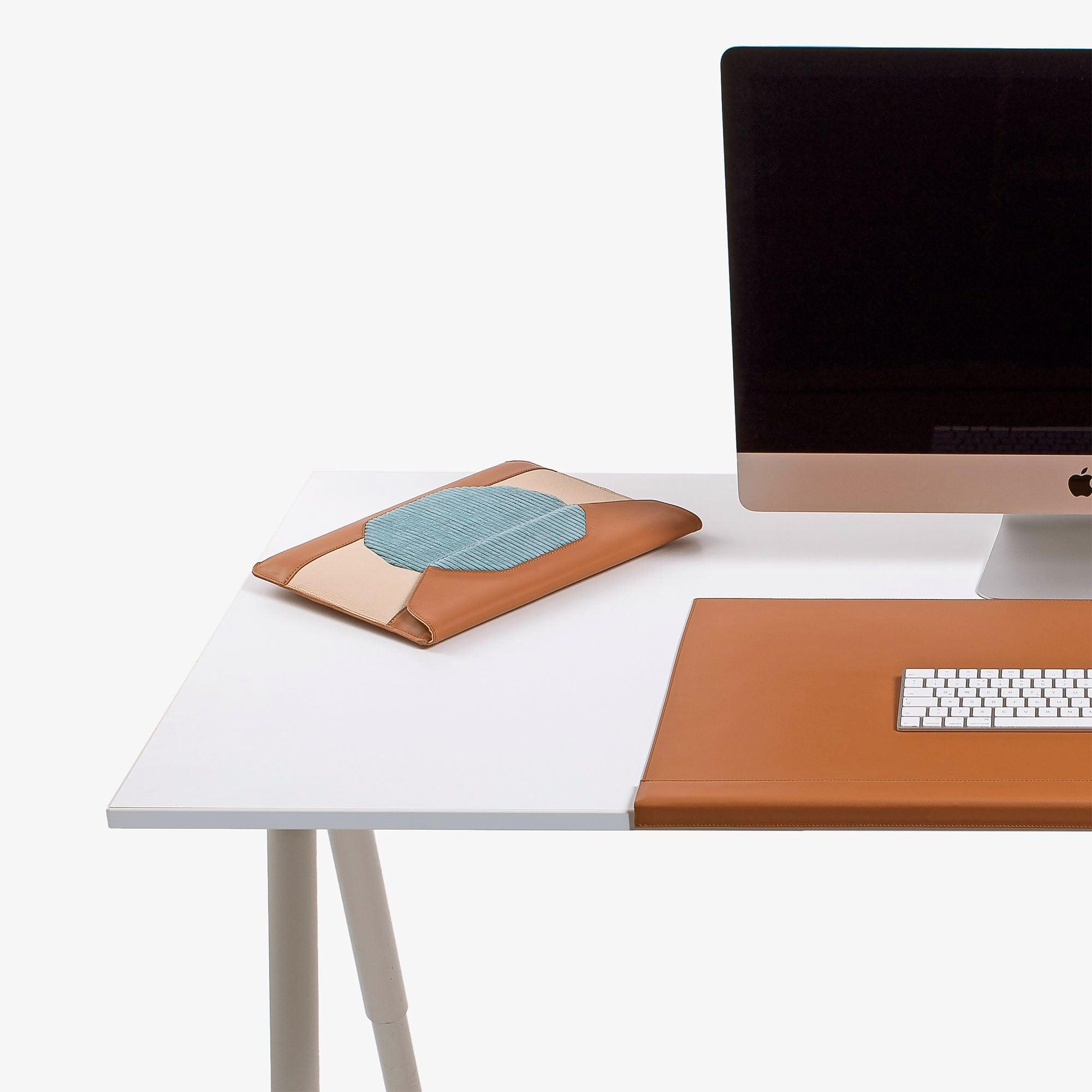 Custom tan leather MacBook sleeve with personalization options