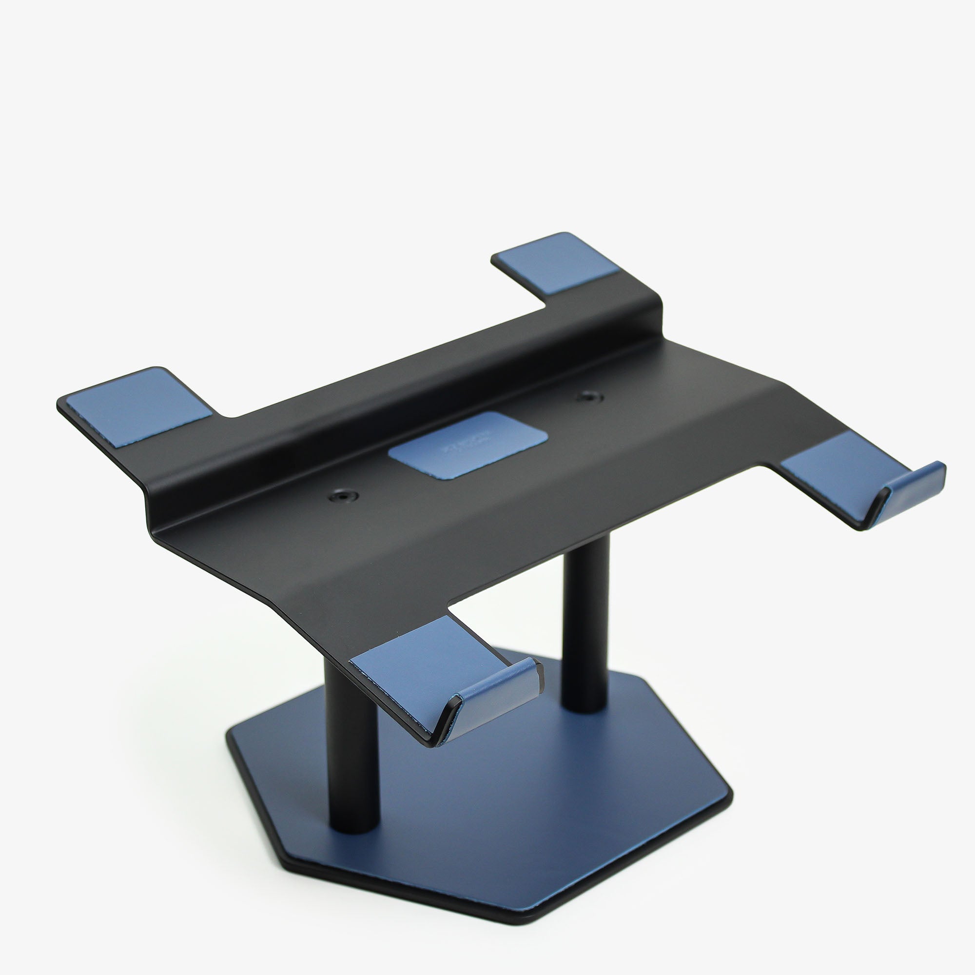 Front view of the ocean-blue leather and aluminum laptop riser on a desk