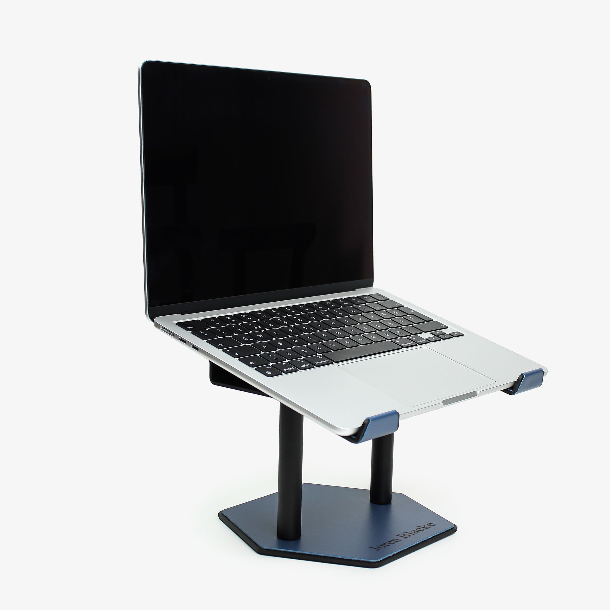 Side angle showing the ergonomic tilt of the ocean-blue laptop stand with macbook