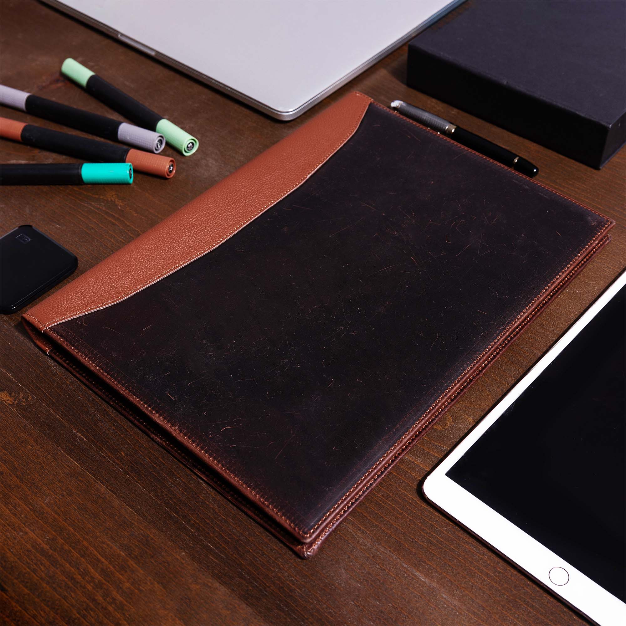Distressed Brown Leather A4 padfolio on the desk