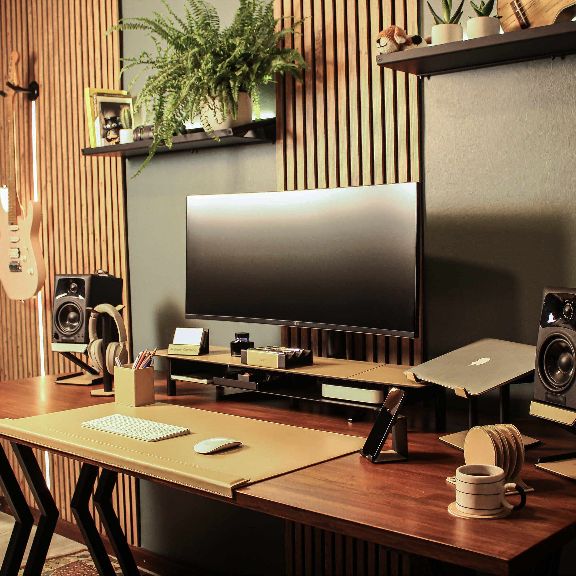 Lifestyle setup featuring the latte laptop riser with matching accessories