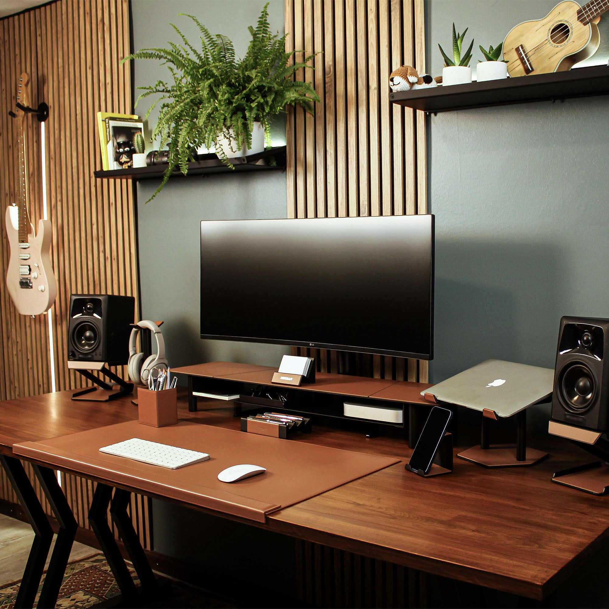 Lifestyle setup featuring the chestnut laptop riser with matching accessories