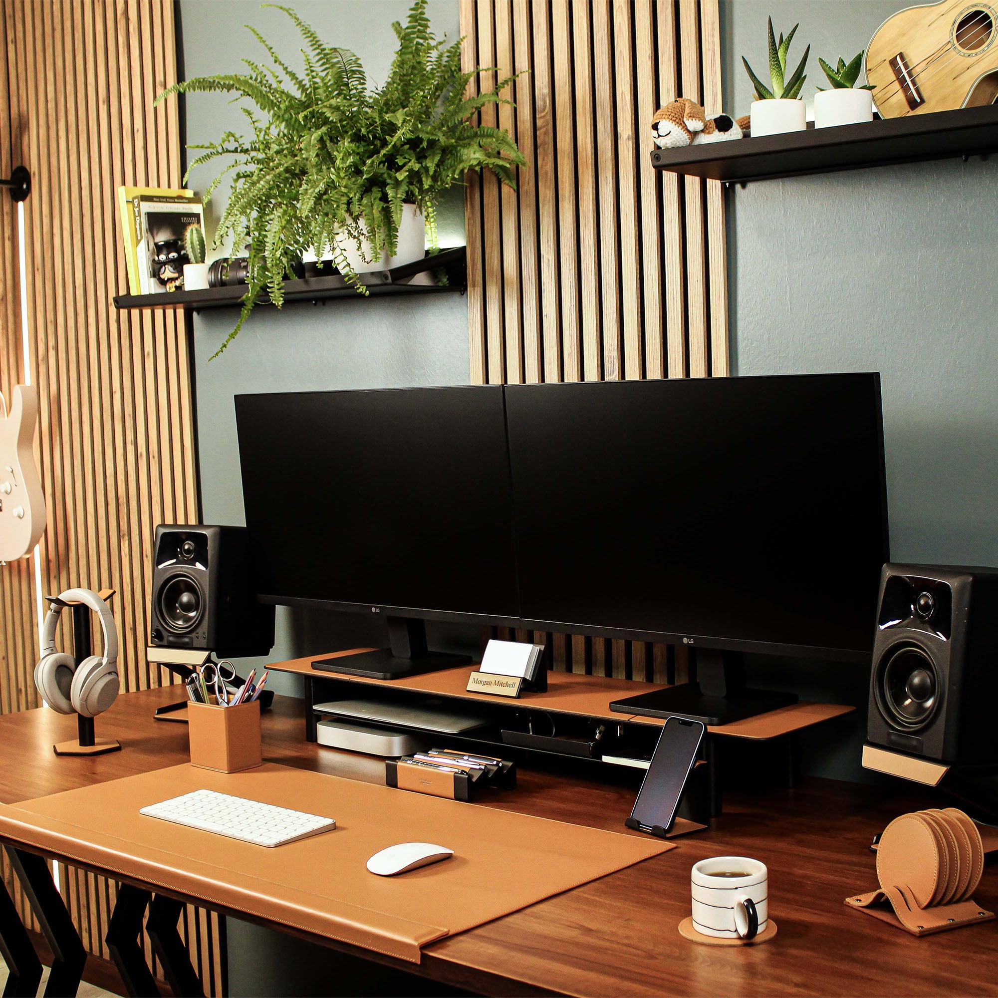 Group photo showing the full metal and leather collection with the cognac pen tray