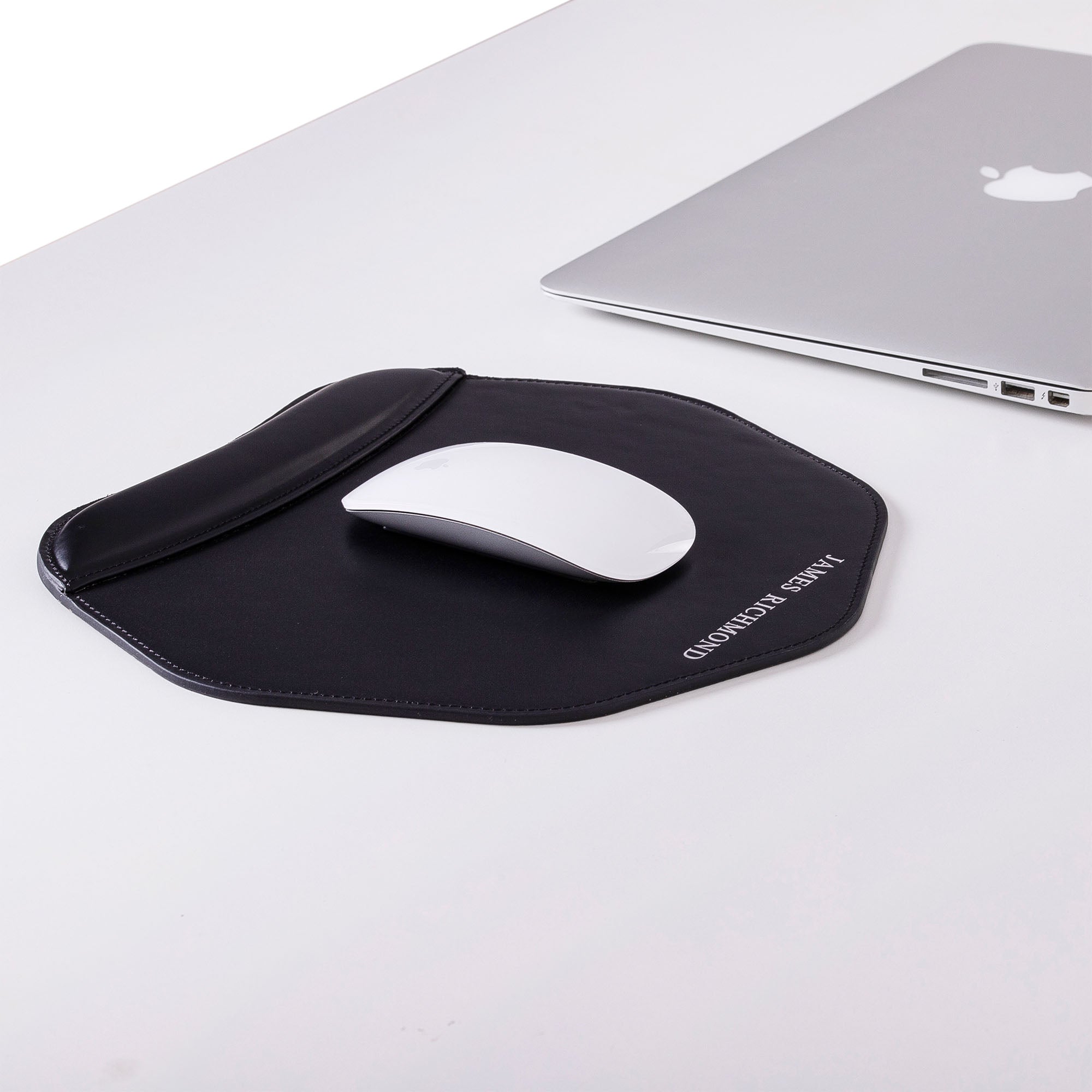 Black Mouse pad with wrist support under magic mouse