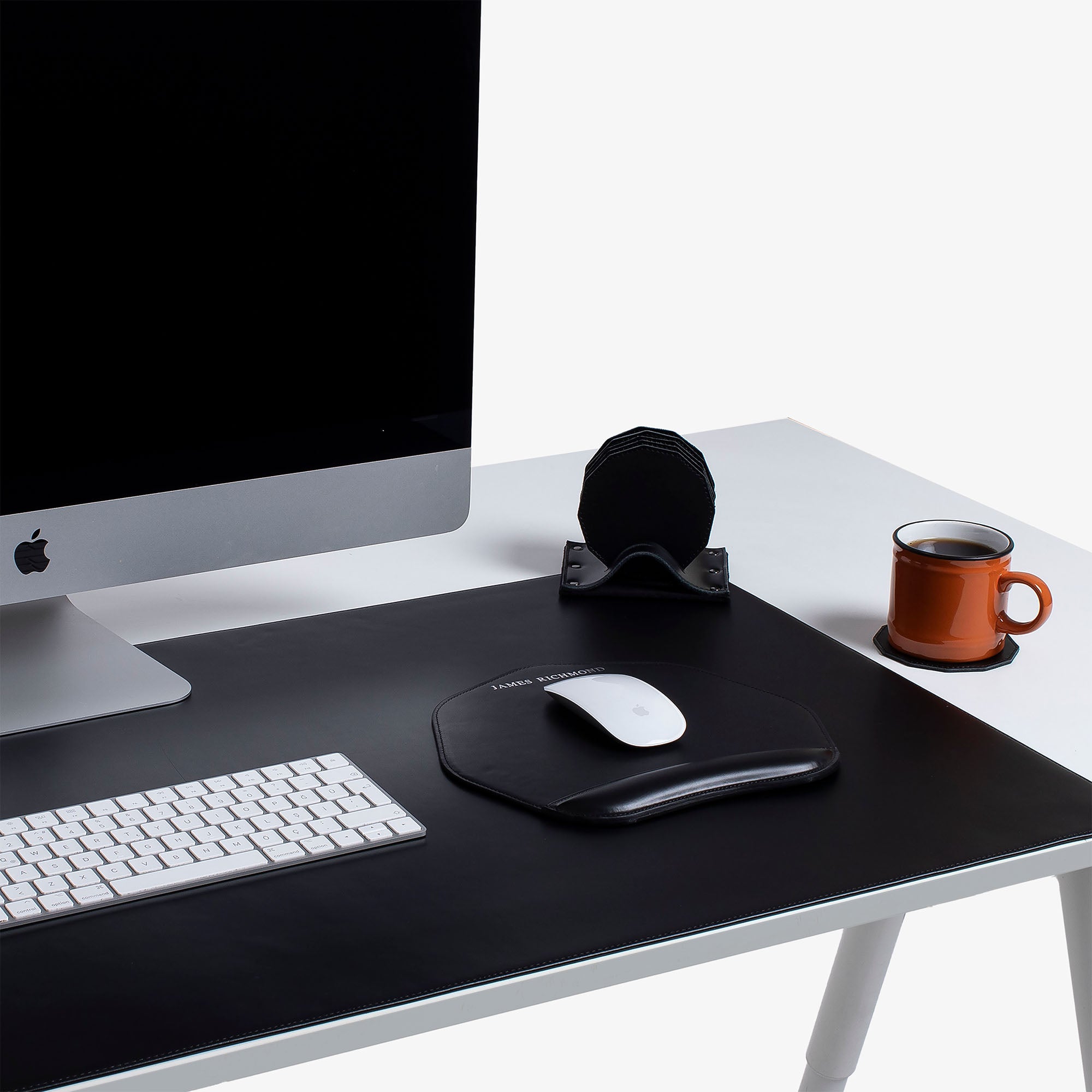 Black Mouse pad with wrist support under magic mouse