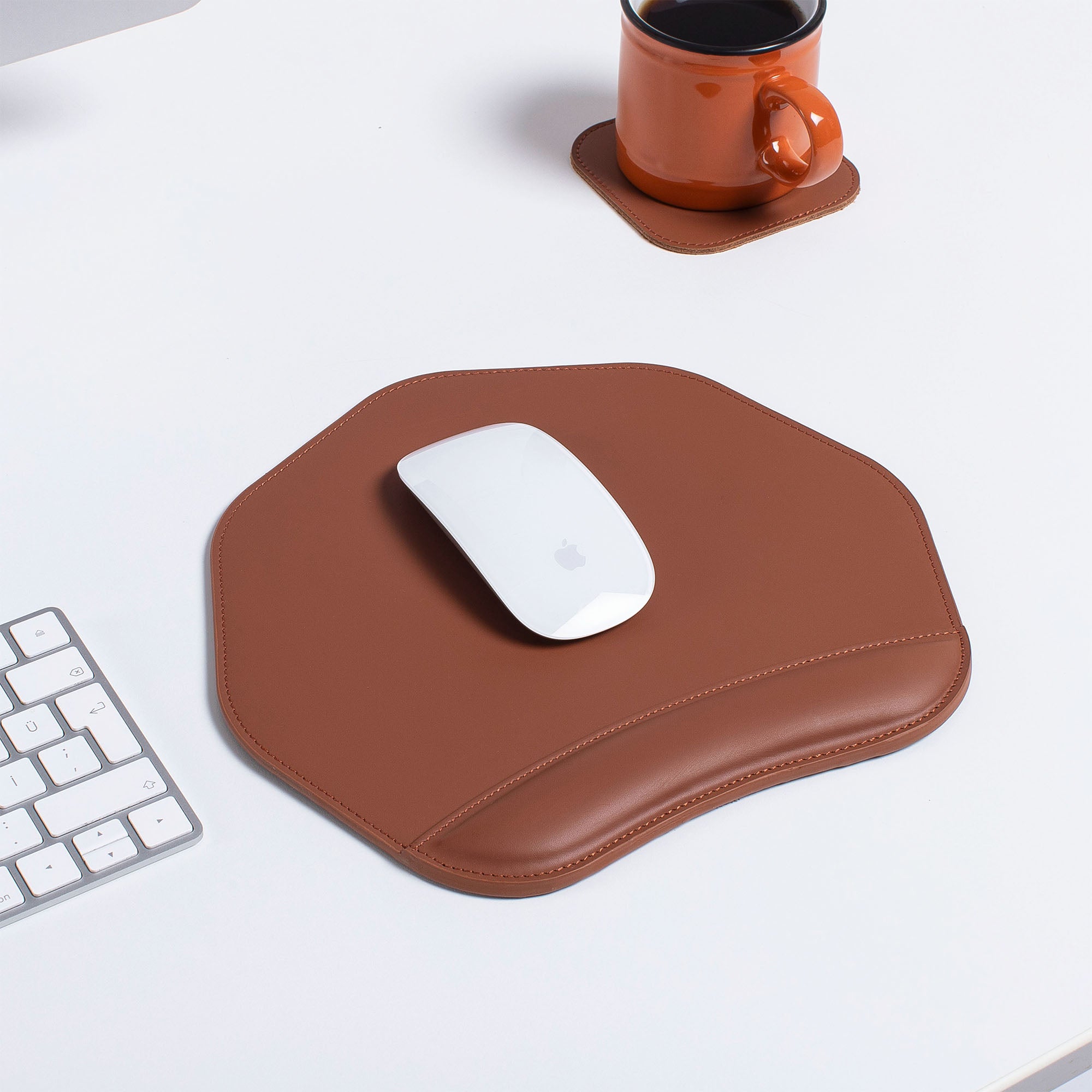 Brown Mouse pad with wrist support under magic mouse