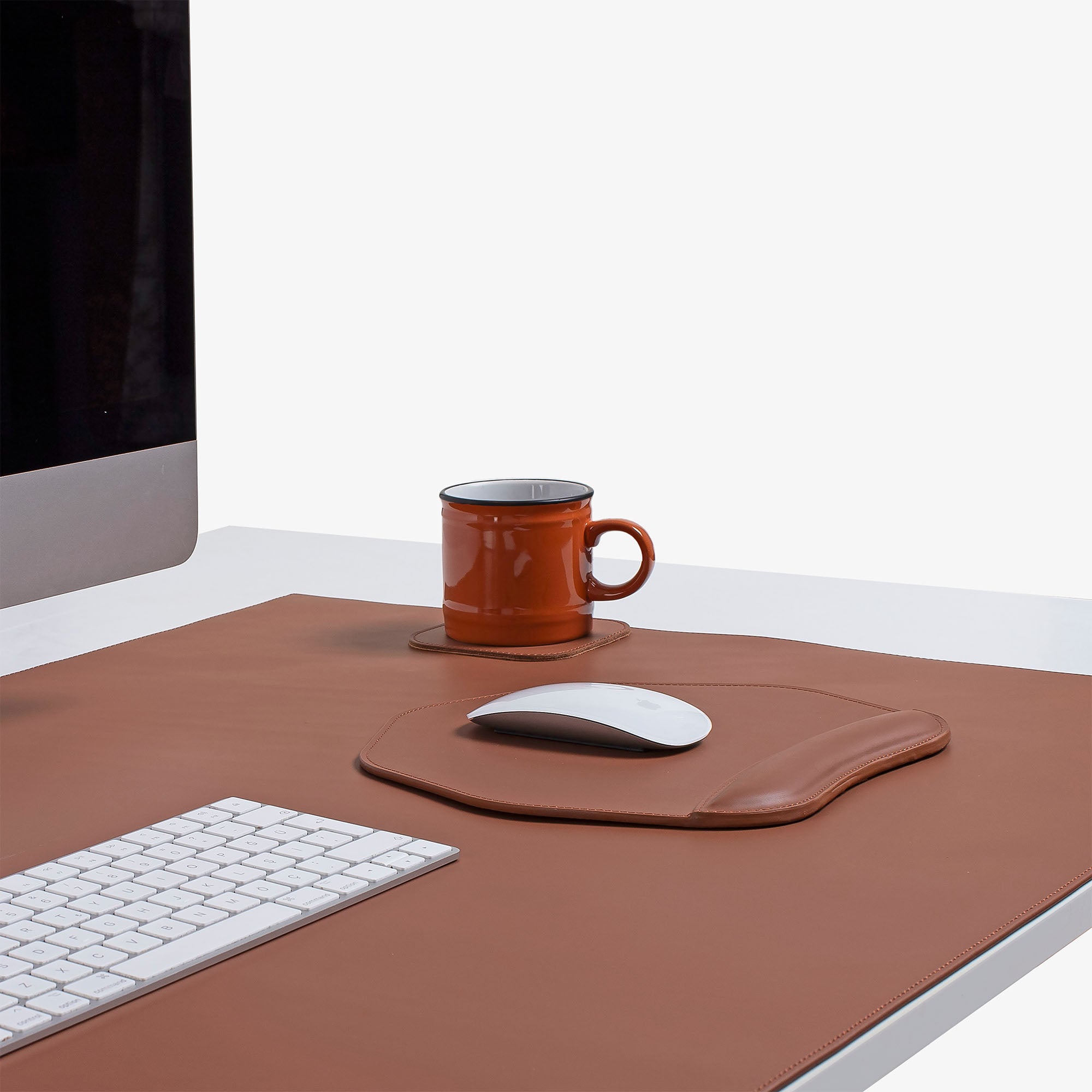 Brown Mouse pad with wrist support under magic mouse