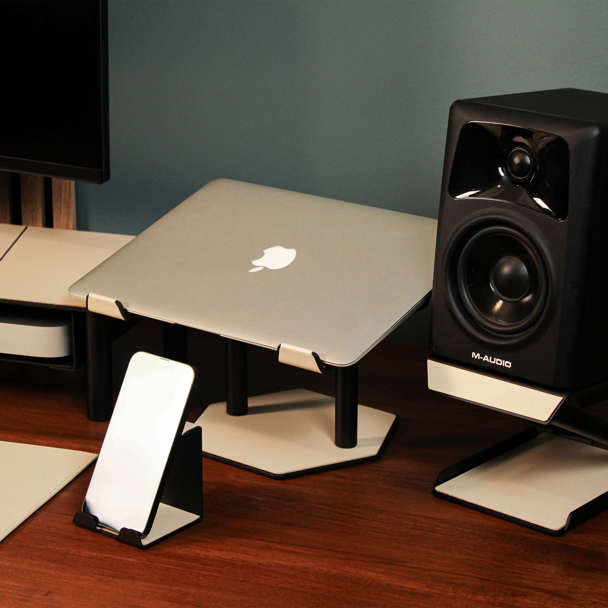 Close-up of the padded base of the beige laptop riser for desk protection