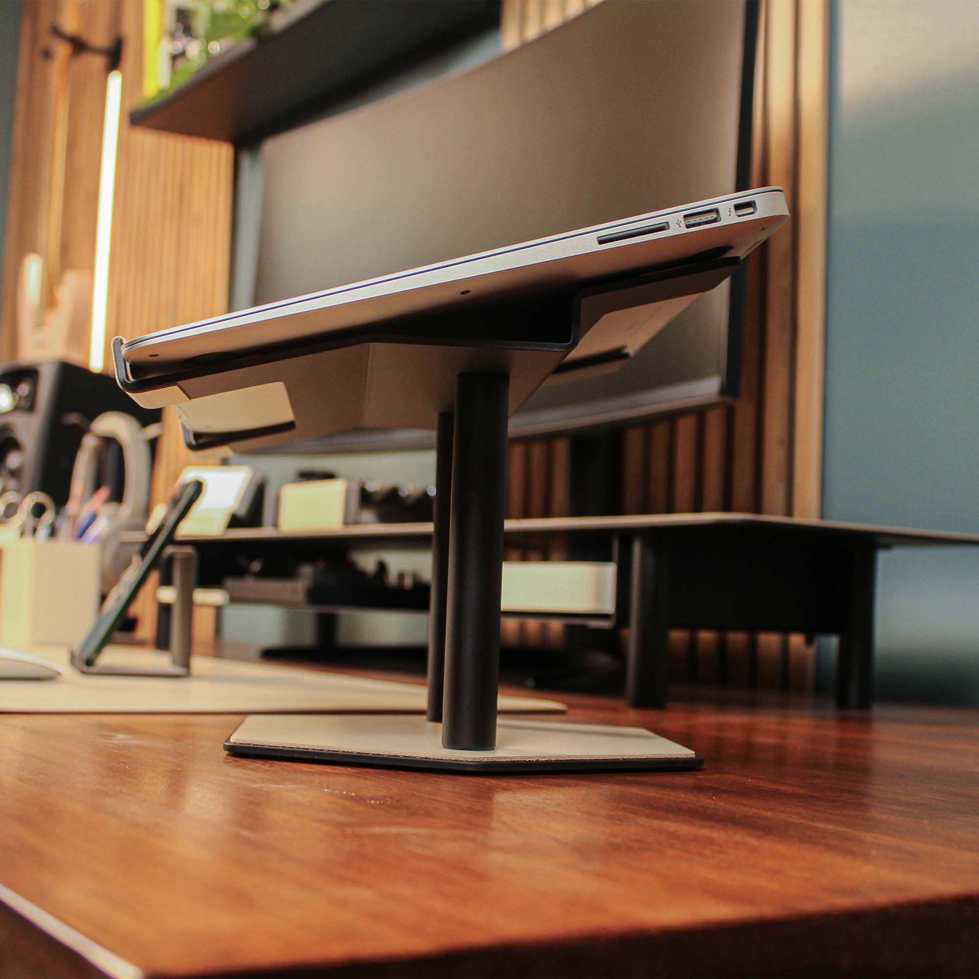 Lifestyle setup featuring the beige laptop riser with matching accessories