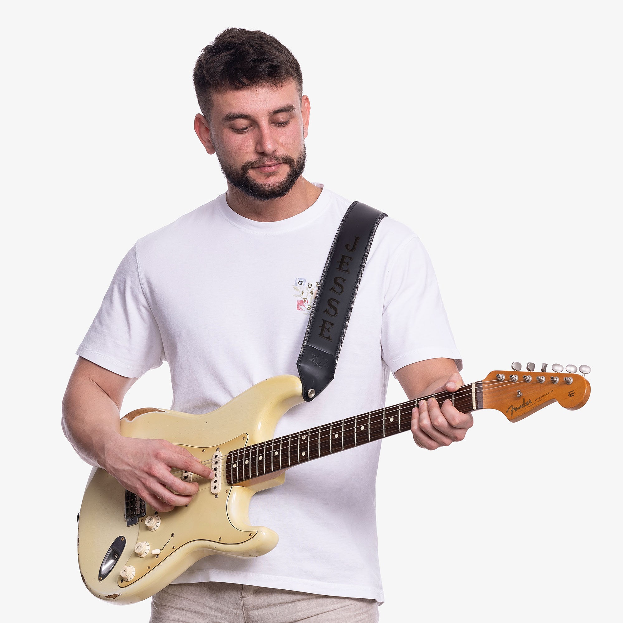 Black Padded Leather guitar strap on model with name engraving