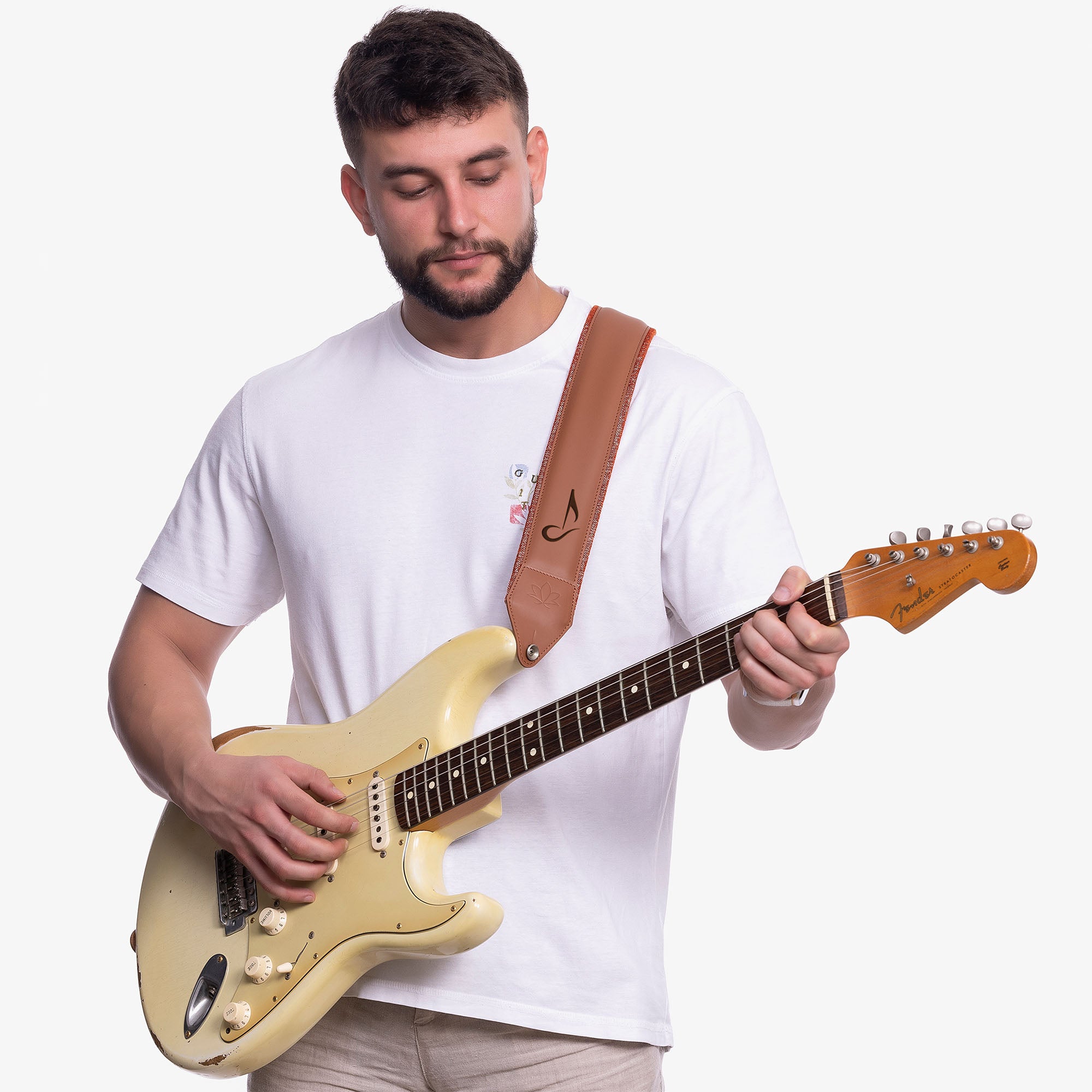 Brown Padded Leather guitar strap on model with custom logo