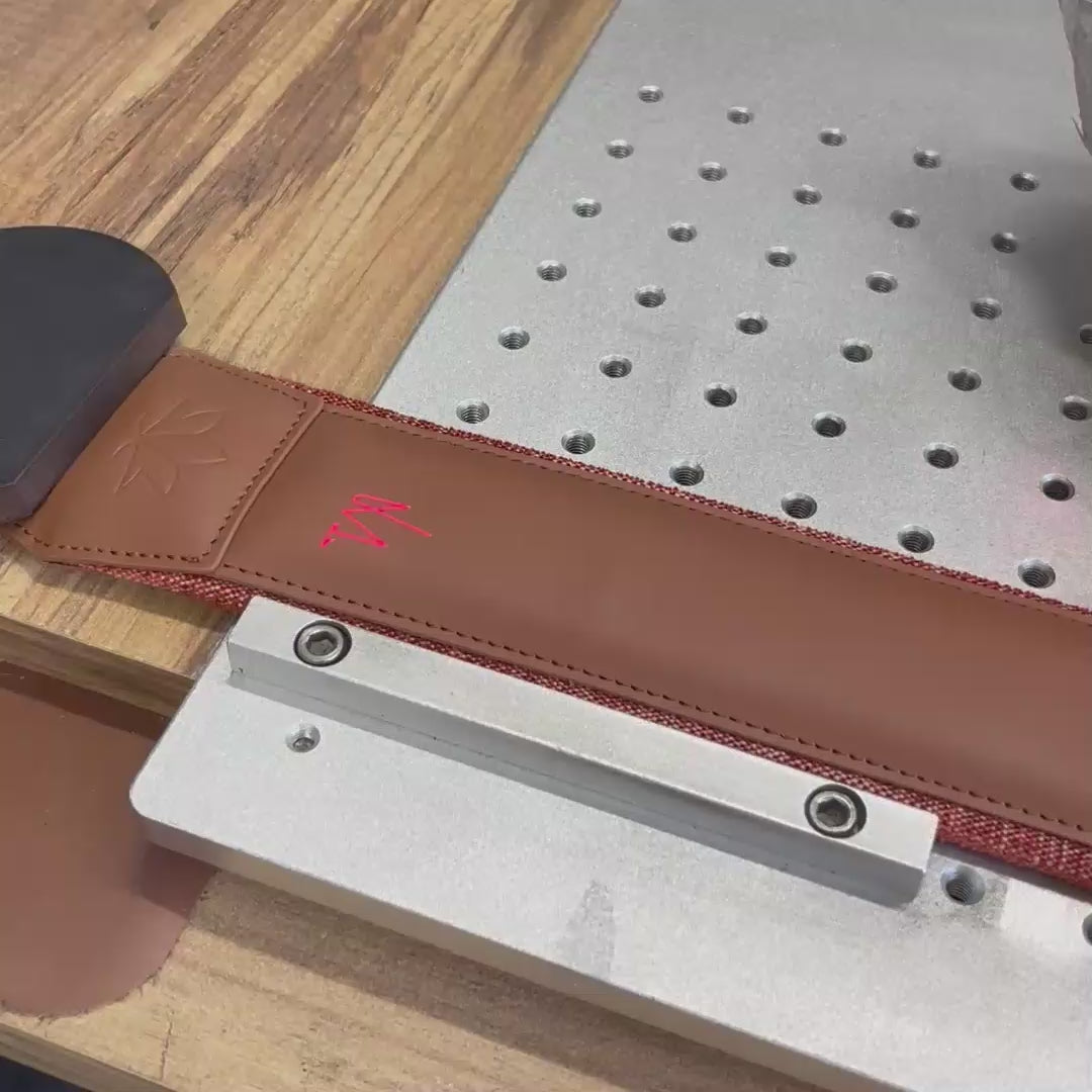 Load video: Personalization process of custom leather guitar strap