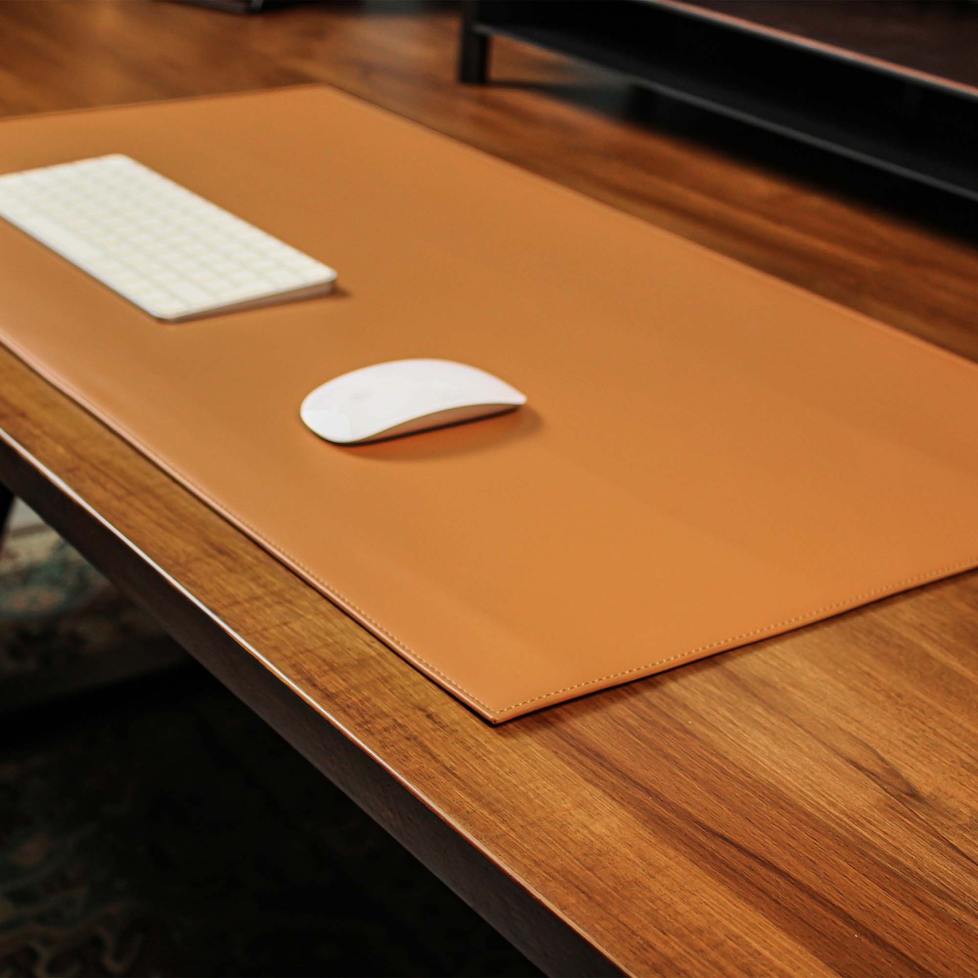 Brown Leather desk mat on the desk 
