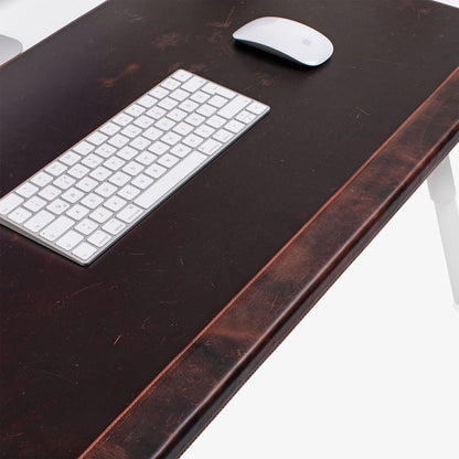 Leather desk mat on the desk 
