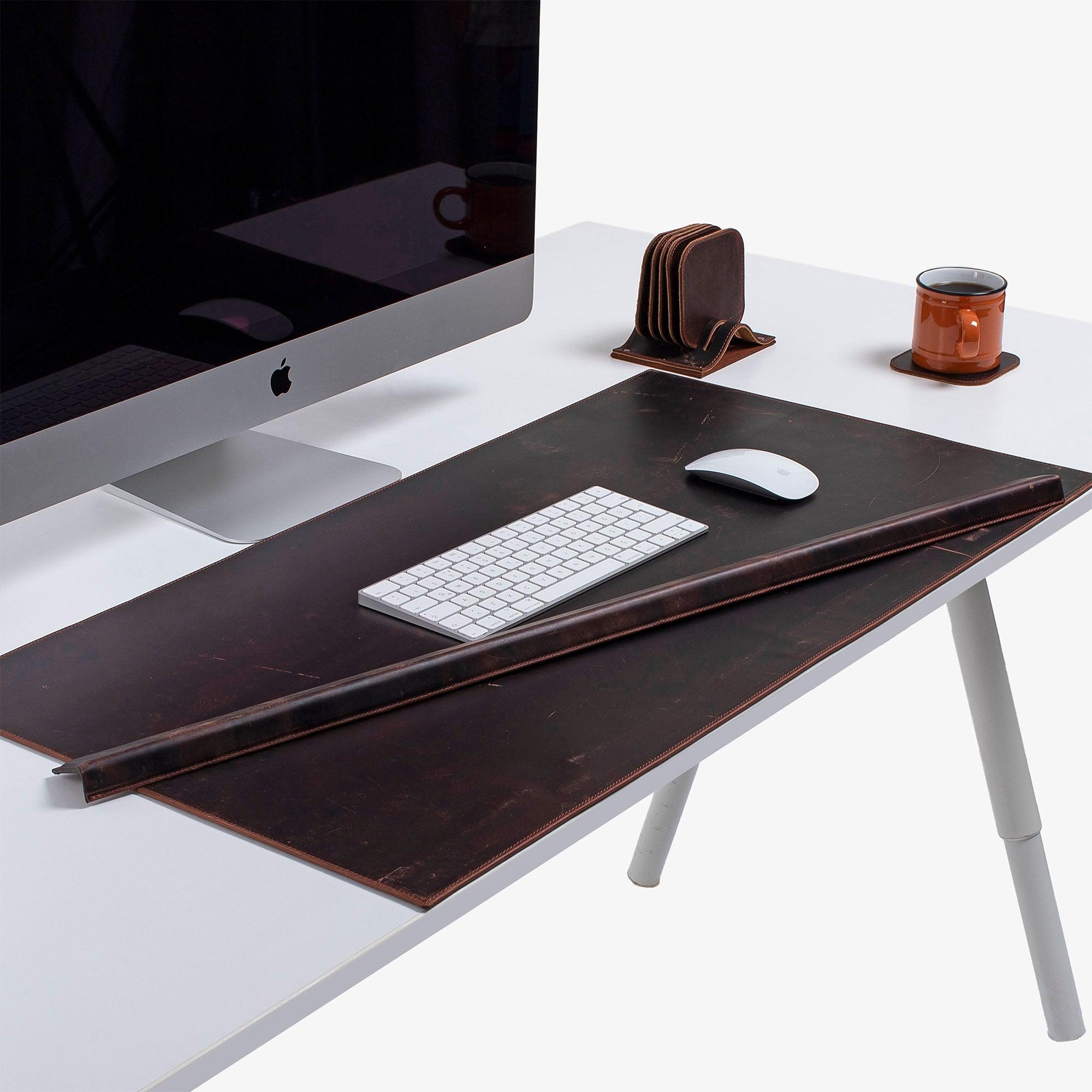 Leather desk mat on the desk 
